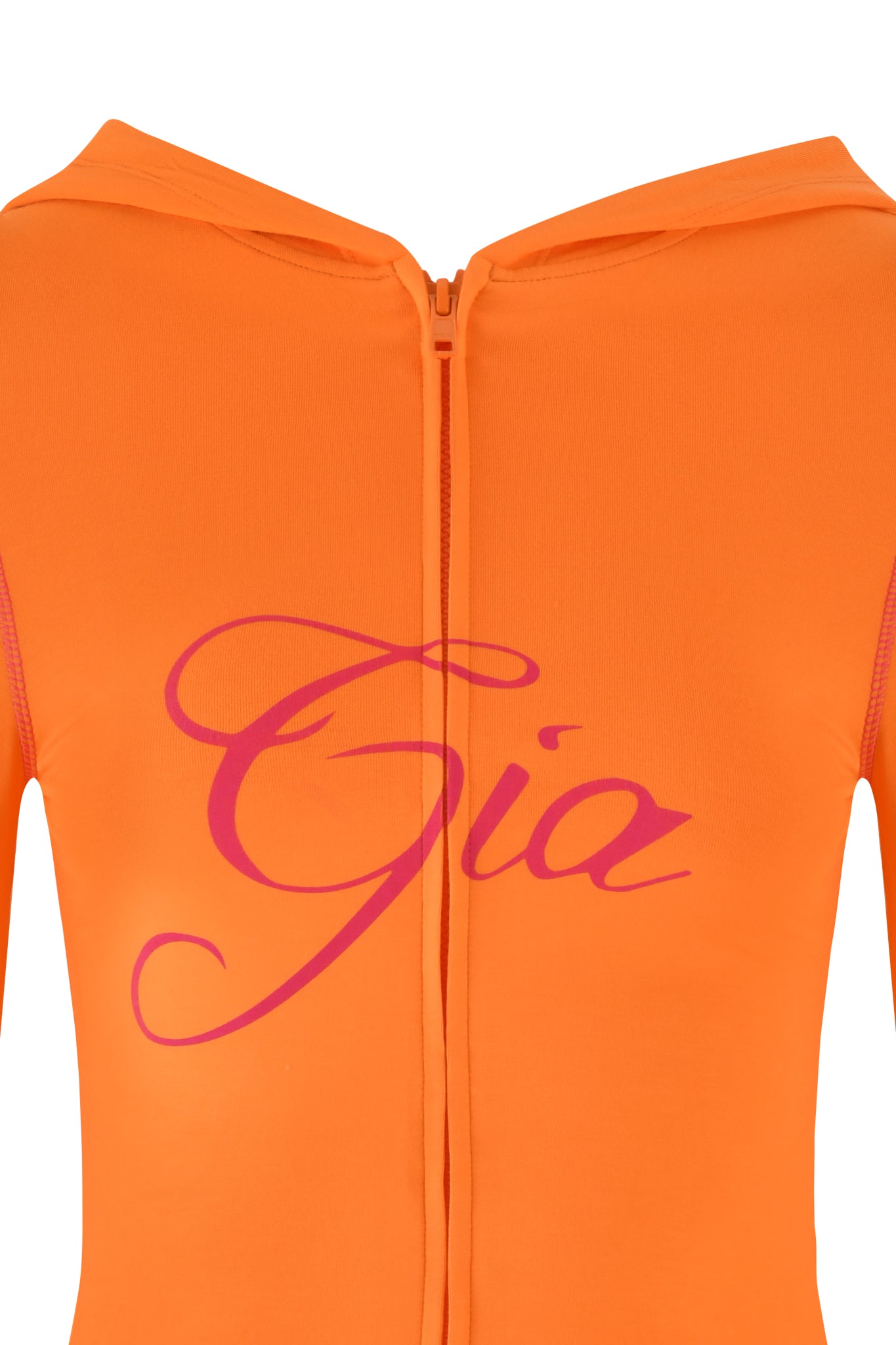The BLARE HOODIE - ORANGE by I.AM.GIA showcases an orange design with a front zipper and "Gia" in pink cursive across the chest, made from soft bamboo fabric for comfort.