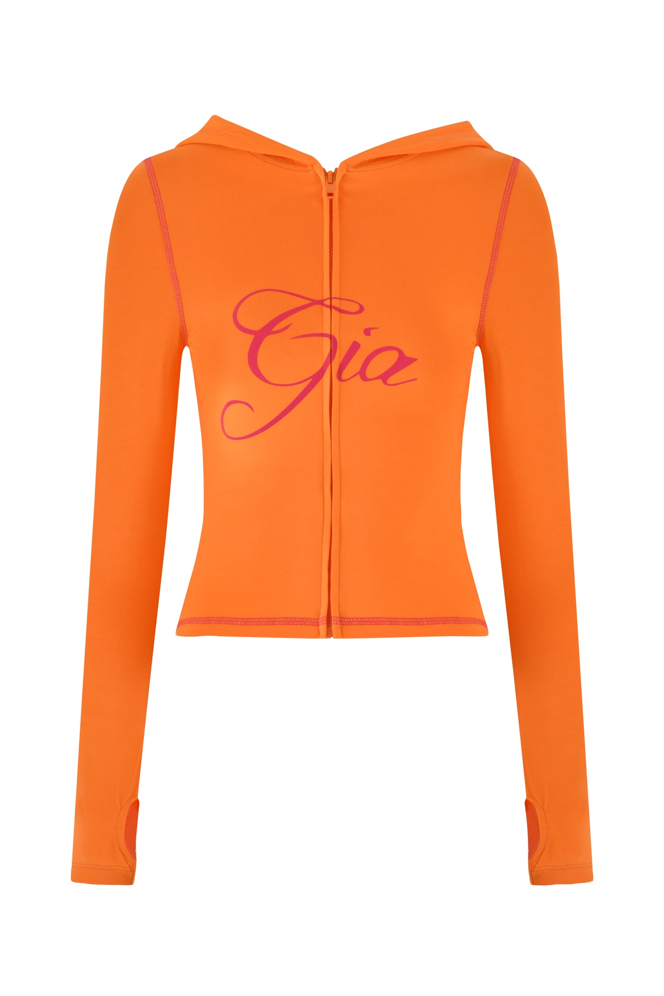 The BLARE HOODIE by I.AM.GIA in orange is a long-sleeve cropped jacket featuring a front zipper, thumb holes, and "Gia" printed in pink script on the chest. It offers a chic bodycon silhouette to effortlessly highlight your style.