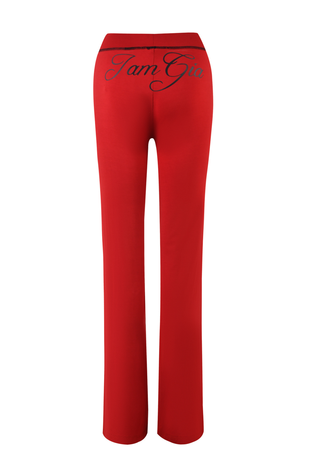 The BLARE TRACKPANT - RED by I.AM.GIA is shown from the back, featuring a high-waisted fit with flared legs and “I am Gia” in black script across the waistband. Crafted from soft bamboo fabric, these trackpants combine comfort and style.