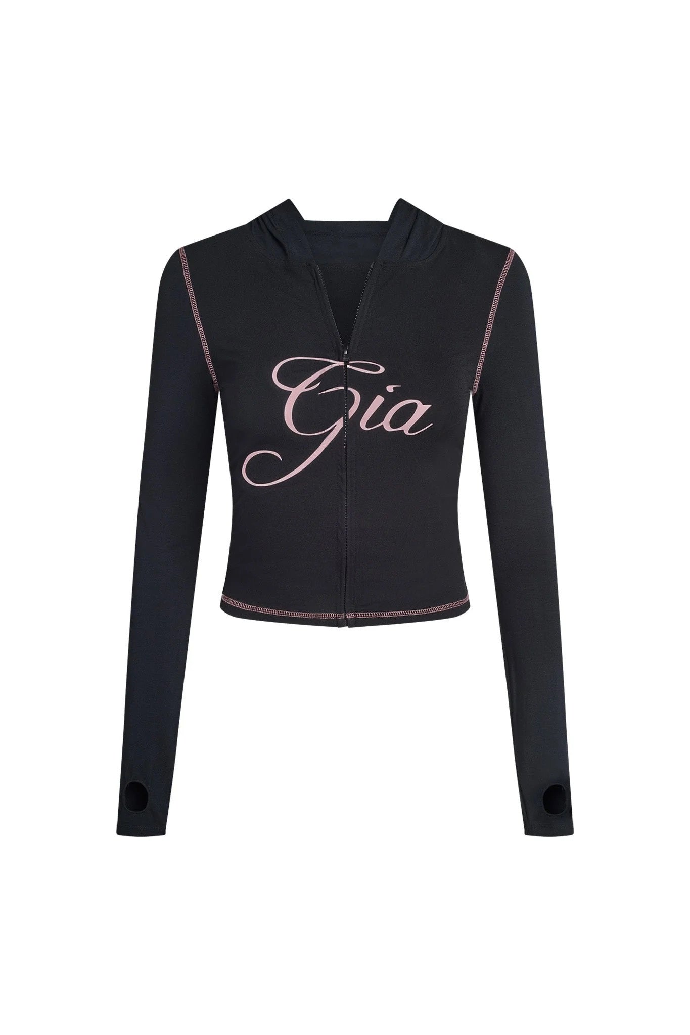 The BLARE HOODIE - BLACK by I.AM.GIA is a black, long-sleeve bodycon crop top with a front zipper, thumb holes, and “Gia” in bold pink script across the chest.