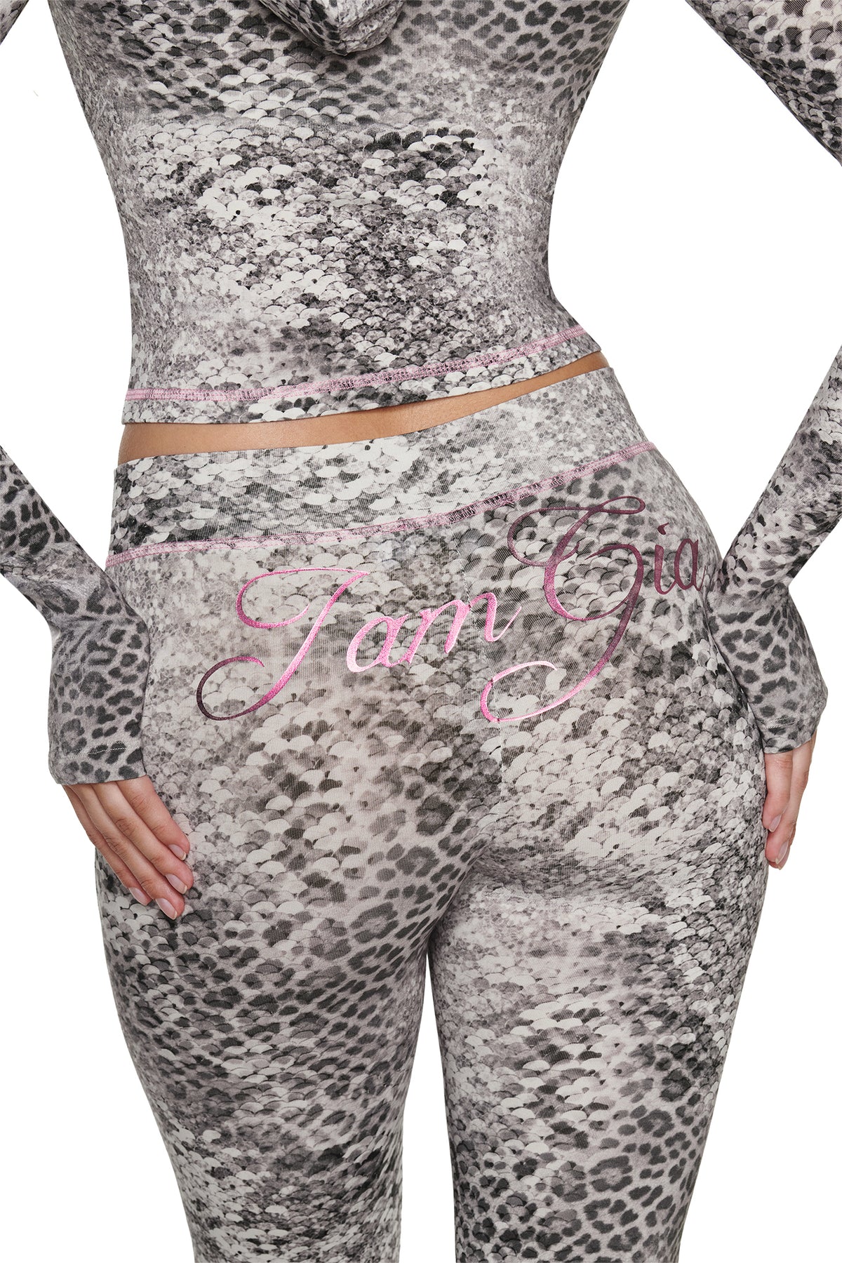 I.AM.GIA BLARE TRACKPANT - SILVER LUXE LEOPARD high-waisted leggings in gray with pink stitched detailing and the brand name embroidered in pink across the lower back.