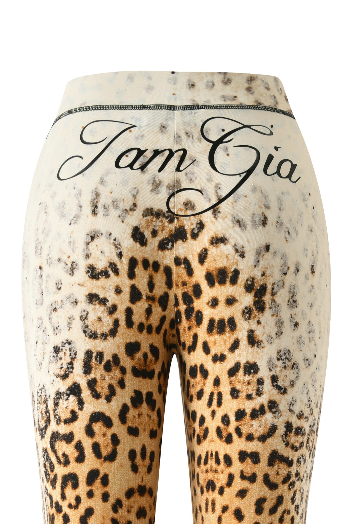 A close-up of the BLARE TRACKPANT in Cream Faded Panthera by I.AM.GIA, showcasing the wild animal print and featuring “I.AM.GIA” written in script across the waistband. The image captures the back view, emphasizing both the bold branding and striking panther-inspired design.