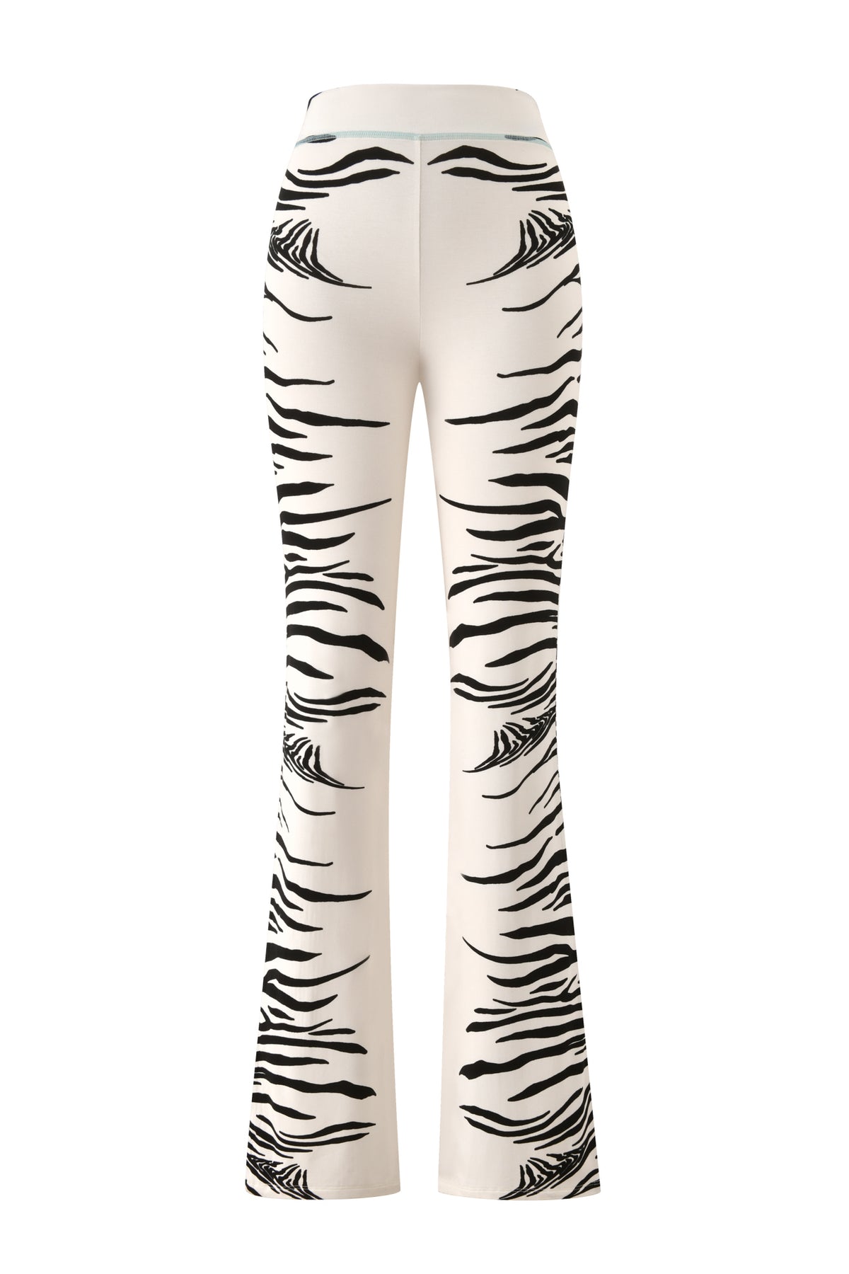The BLARE TRACKPANT - FINE LINE ZEBRA by I.AM.GIA features a high-waisted flare silhouette, expertly crafted from bamboo fabrication and adorned with bold black zebra stripe patterns running vertically along the sides and legs. Shown from the back against a white background, these trackpants offer the perfect statement piece for anyone seeking a standout zebra print style.