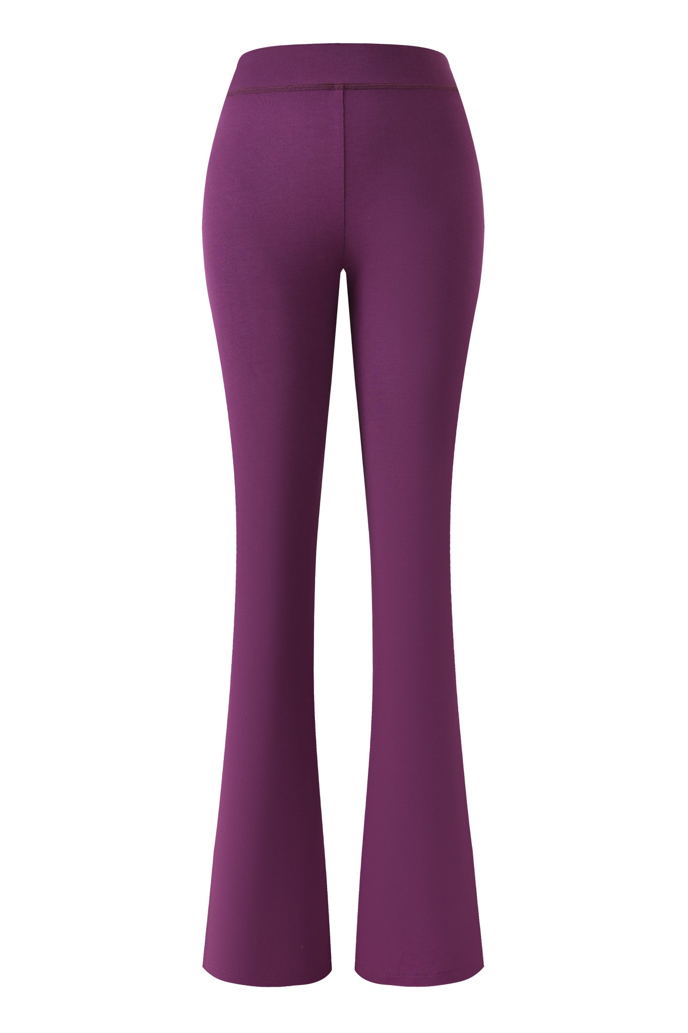 The I.AM.GIA BLARE TRACKPANT in purple plum features a low-rise waist and pairs stylishly with white heels.
