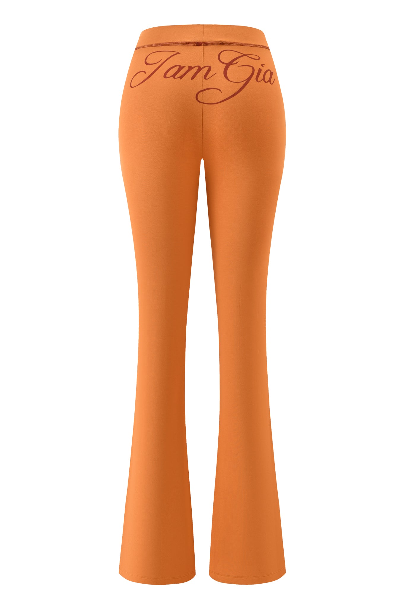 The BLARE TRACKPANT - PUMPKIN by I.AM.GIA features a bodycon silhouette and low-rise waist in a bold orange hue.