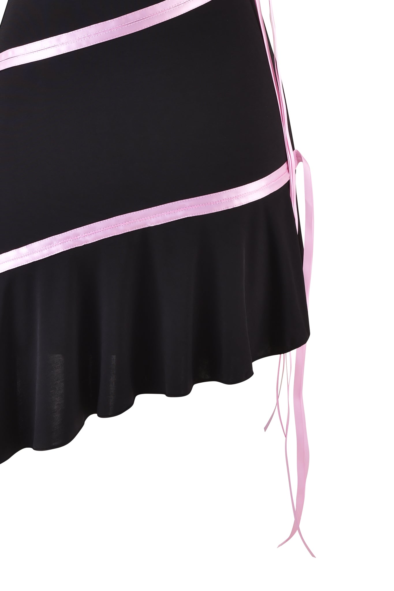 A close-up of the I.AM.GIA ARLY MINI DRESS - BLACK : PASTEL PINK showcases asymmetrical pink satin ribbon details on black fabric. The strapless neckline is paired with a flared skirt featuring a ruffled hem, while pink ribbons drape along the side, all set against a white background.