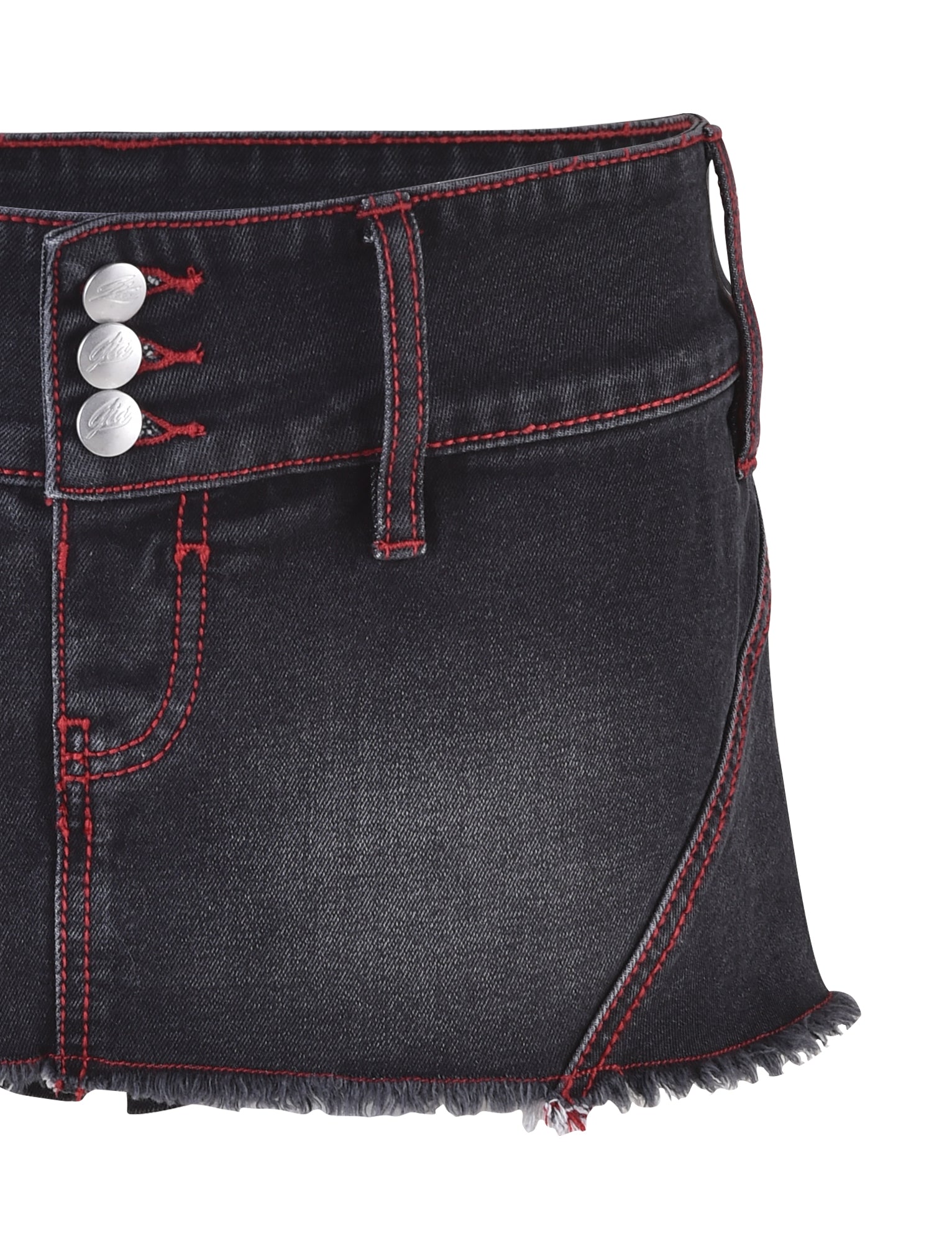 Close-up image of the I.AM.GIA NYKKO SKORT in black/red, showcasing red stitching, a frayed hem, and three prominent silver buttons on the front. The design features visible belt loops and a front pocket with additional red stitching.