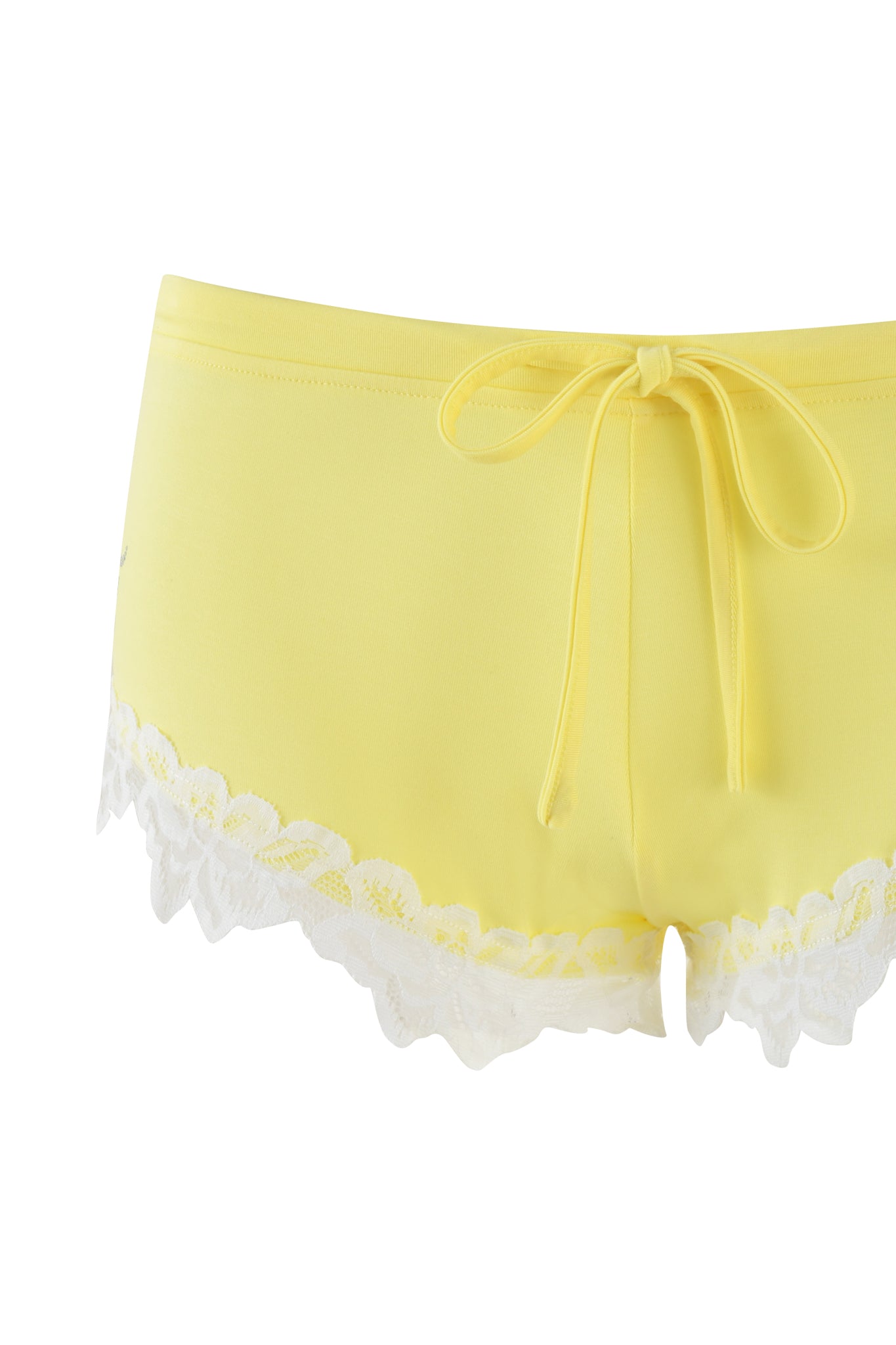 The CELESTE SHORT - YELLOW by I.AM.GIA is a pair of baby yellow micro mini shorts with a bodycon fit, adorned with white lace trim at the edges and finished with a charming bow at the waistband.