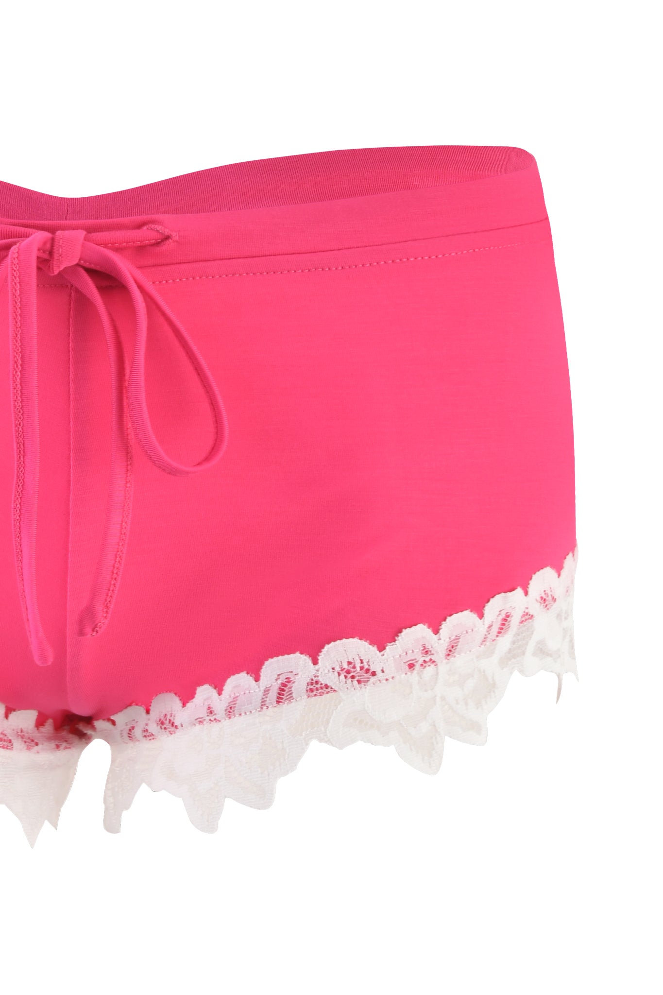 The CELESTE SHORT - PINK : HOT PINK from I.AM.GIA features bright pink shorts with a delicate white floral lace trim at the bottom and a small bow tie at the waist. The floral lace detail adds a feminine touch to its sporty design, while the soft fabric ensures maximum comfort.