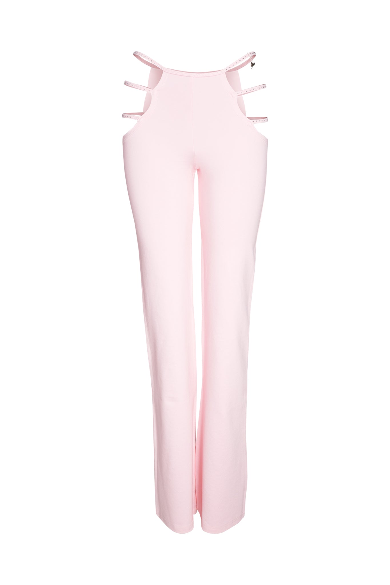 The ROXANNA PANT - PINK : BABY PINK by I.AM.GIA features a stylish design with three thin straps on each side near the waistband, creating chic cutouts at the hips. These light pink flare pants are made from a smooth and slightly stretchy fabric, ensuring both style and comfort.