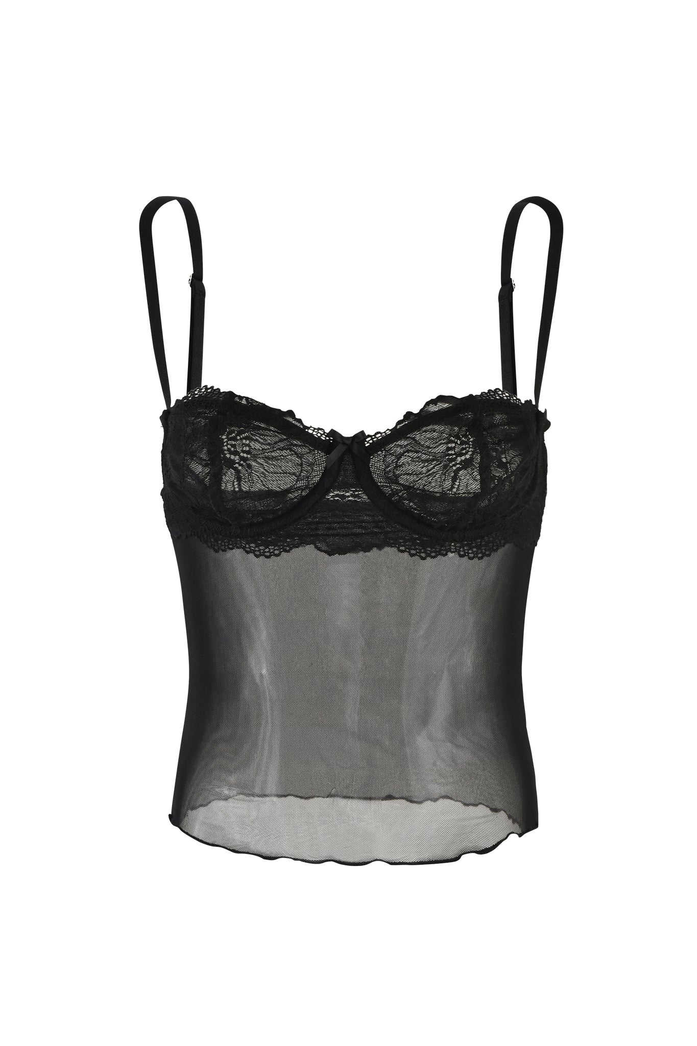 The SILO TOP - BLACK by I.AM.GIA is a black sheer camisole with lace detailing around the bust area. It features adjustable spaghetti straps and a slightly scalloped hemline, exuding a delicate and feminine look. The translucent fabric allows some visibility through the garment, embodying the chic style of I.AM.GIA.
