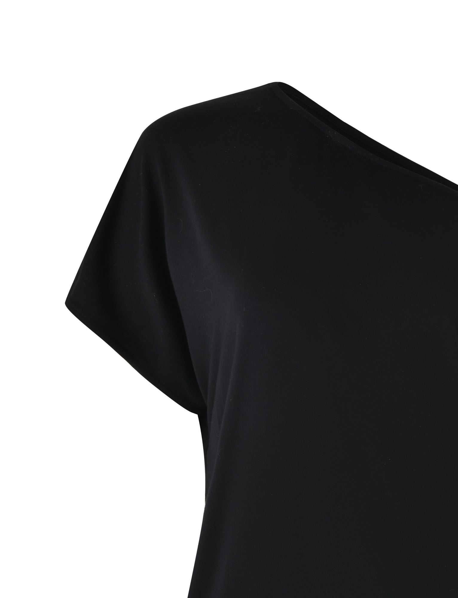 A close-up image of part of a black, short-sleeved I.AM.GIA EZIA ROMPER. The romper has a smooth texture and features a slightly asymmetrical neckline that is partially visible, with fabric draping elegantly. The romper's minimalist and sleek design is emphasized in the image.
