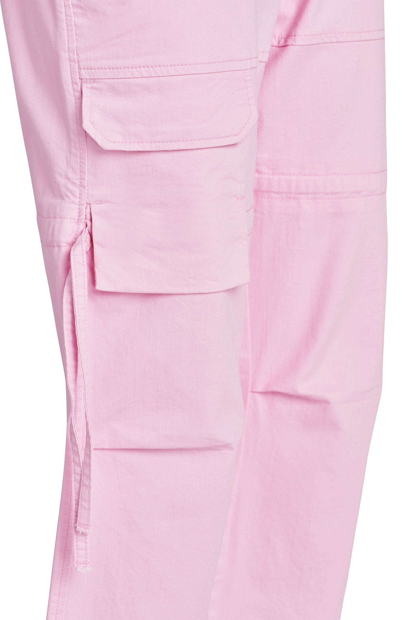 Close-up view of the NAIMA CARGO PANT - PINK BABY by I.AM.GIA, featuring a side pocket with a flap and button detail near the knee area. The fabric appears to be lightweight with visible stitching, and there is a strap hanging from the pocket.