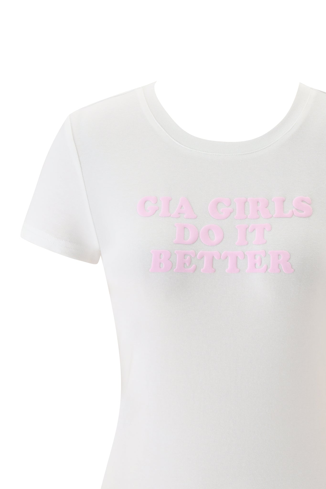 The ODEZIA TOP - GIA GIRLS by I.AM.GIA is a white baby tee featuring light pink, raised "GIA GIRLS DO IT BETTER" text—perfect for any casual look.