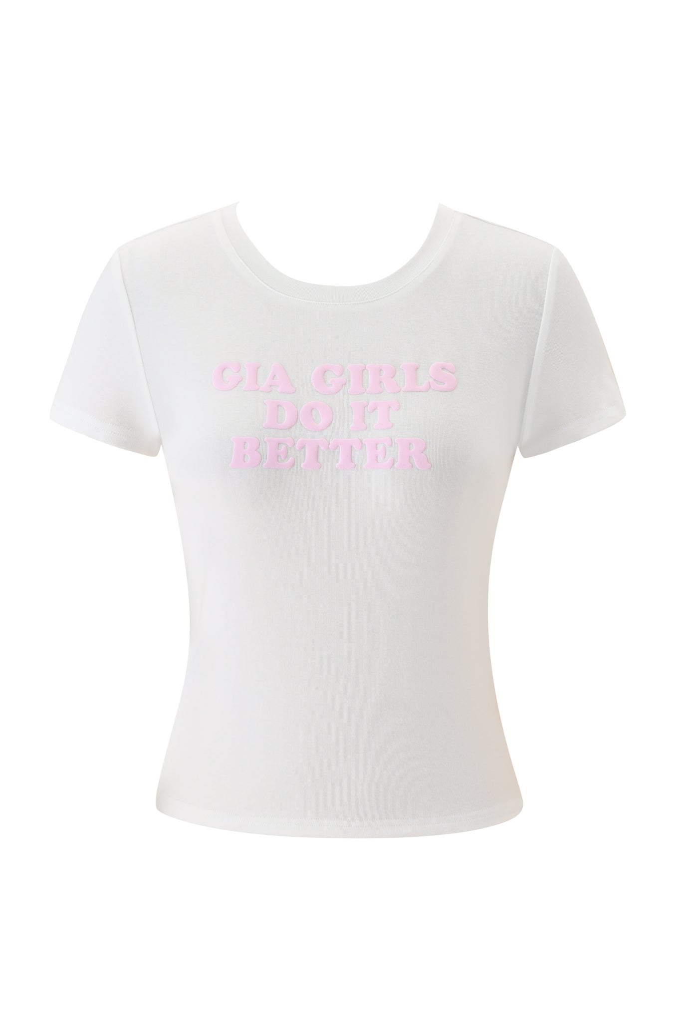The ODEZIA TOP - GIA GIRLS from I.AM.GIA is a white fitted baby tee with short sleeves, featuring "GIA GIRLS DO IT BETTER" in light pink caps across the chest.