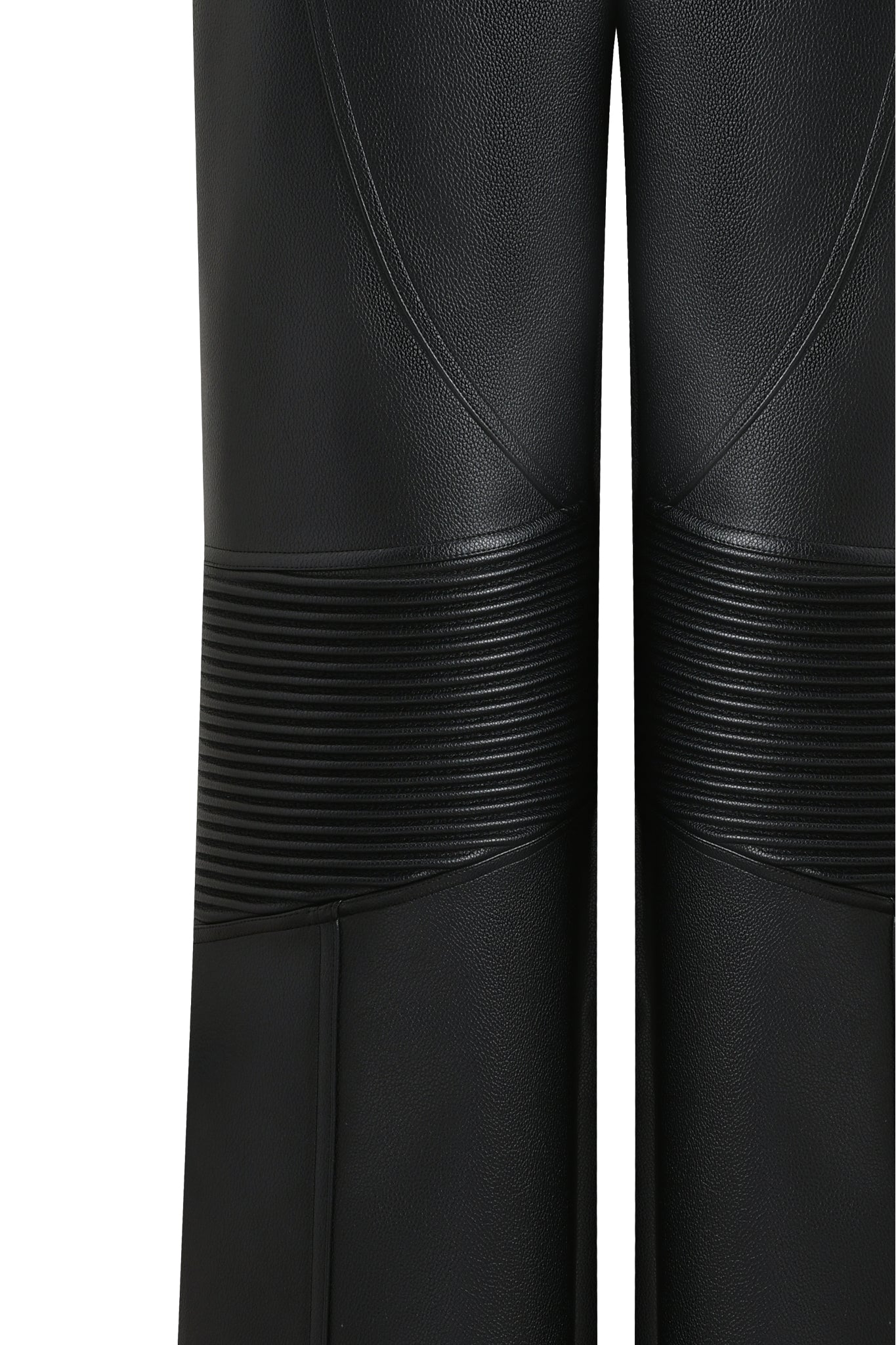 The KRISTIE PANT - BLACK by I.AM.GIA features black faux leather with ribbed, textured detailing above the knees and curved seam lines for a sleek, modern style.