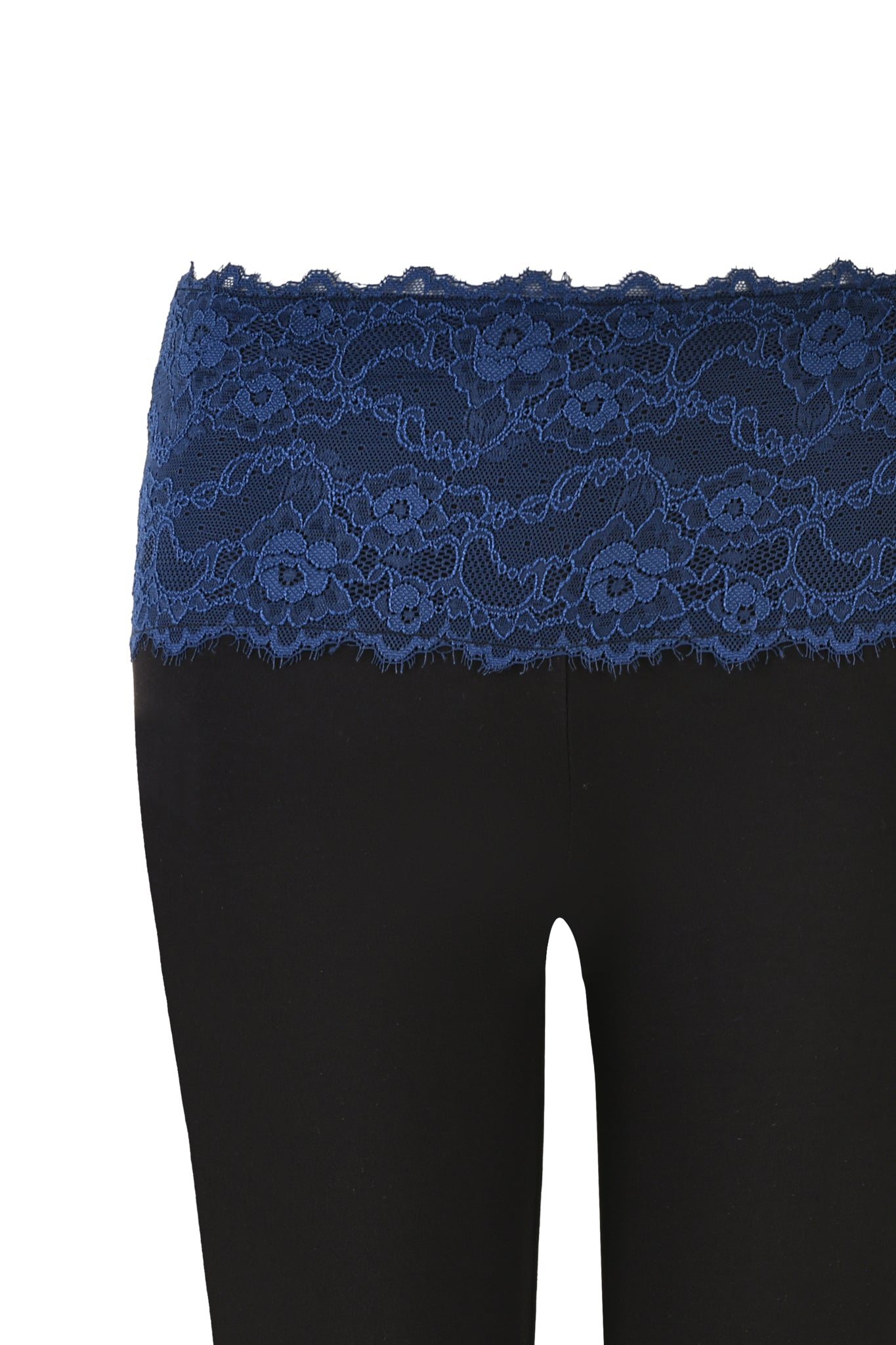 A detailed close-up of the waist section of ADELLA CAPRI - BLACK : FLORAL : BLACK ORCHID by I.AM.GIA reveals its sophisticated design. The top is beautifully decorated with a wide, intricate blue lace waistband featuring a floral pattern. Crafted from bamboo fabrication, these capri pants offer both comfort and elegance. The white background accentuates the fabric details exquisitely.