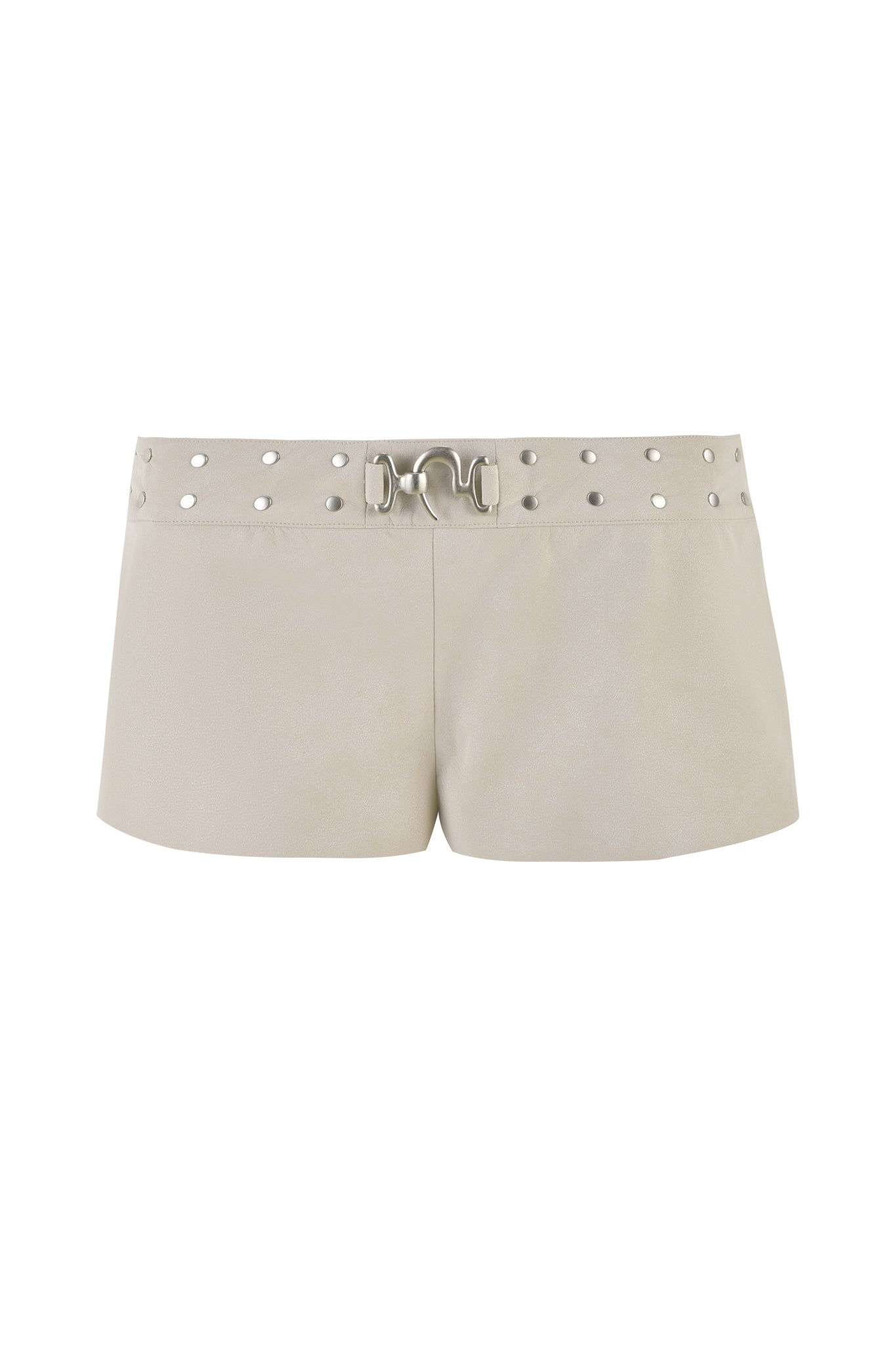 A pair of DOLLY SHORT - NEUTRAL : TAN by I.AM.GIA featuring a silver buckle belt with metal stud accents around the waistband. These low-rise waist beige leather shorts showcase a sleek, minimalist design with no visible pockets or additional embellishments apart from the studded belt.