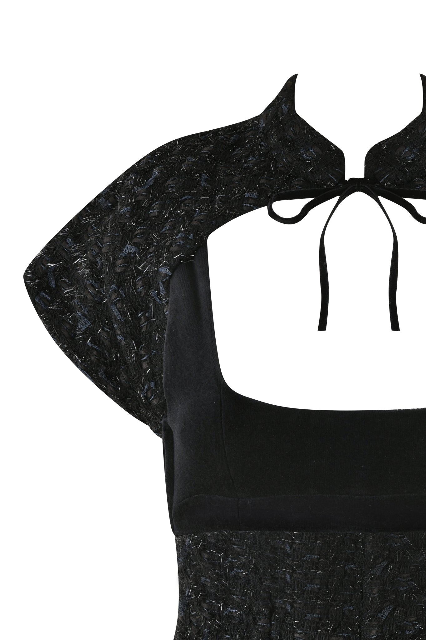 A close-up of the SAFFRON 3 PIECE CORSET - BLACK by I.AM.GIA showcases its elegant and sophisticated design. Featuring a square neckline, the corset also includes short, textured sleeves and a keyhole collar with long black ribbon ties. Crafted from smooth and boucle fabrics, it exudes an added touch of texture.