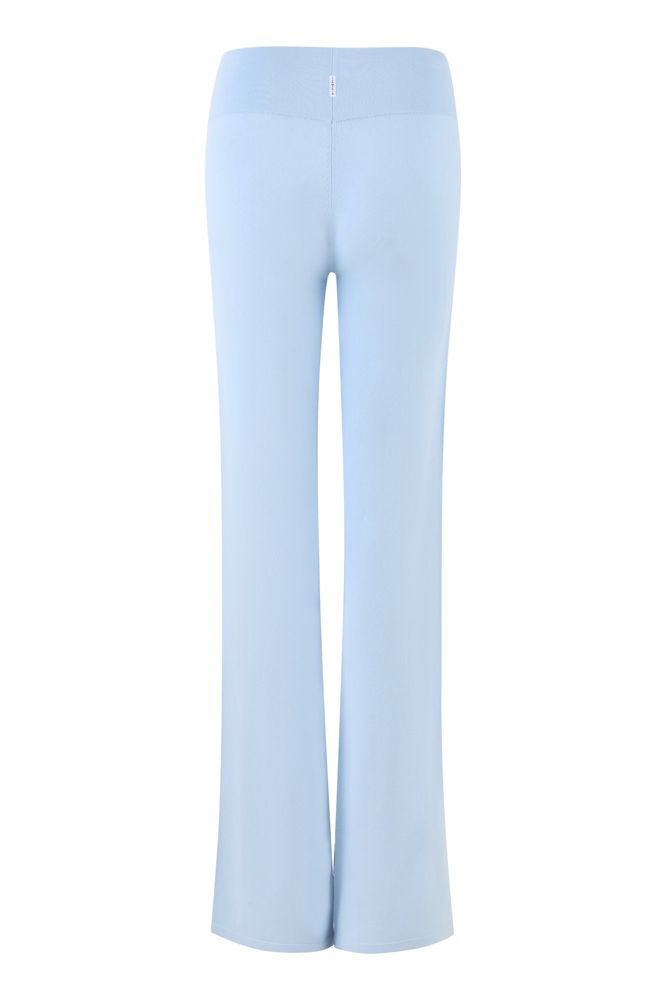 The AUDRINA PANT in Powder Blue by I.AM.GIA features a light blue color, high-waisted, and wide-leg design shown from the back. The fabric appears soft and slightly stretchy, complemented by a tall rib waistband for a smooth finish with no visible pockets or detailing.