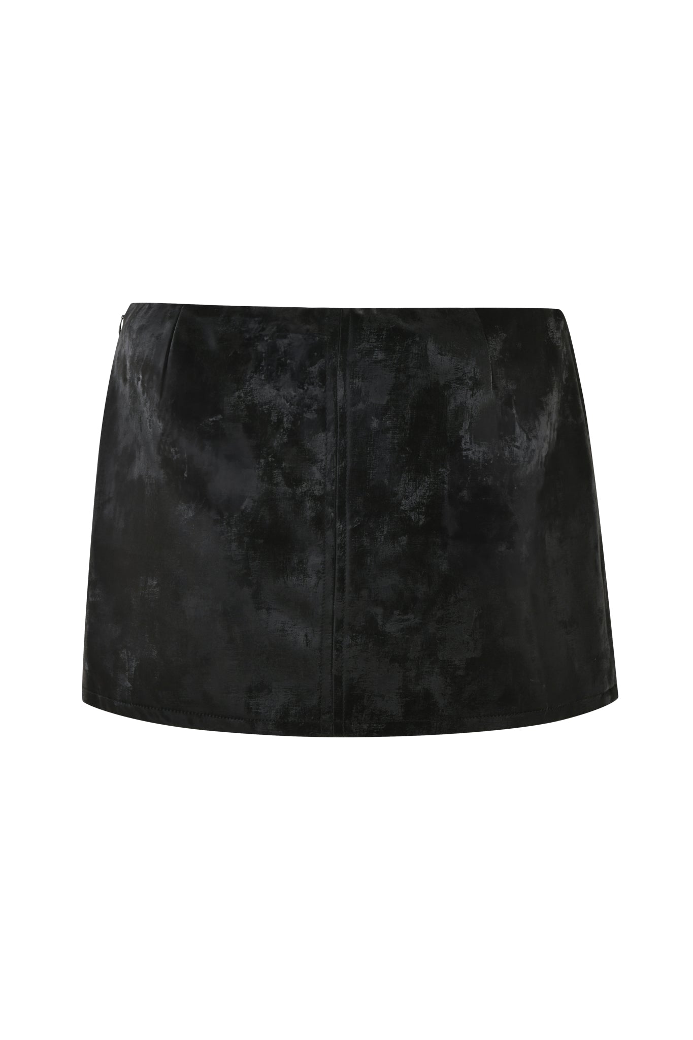 The FRANCINE SKORT - BLACK by I.AM.GIA is a sophisticated black velvet mini skirt with a simple, straight cut design. Featuring subtle texture variations and a slight sheen for a luxurious appearance, this bodycon skort offers versatility with no visible embellishments, making it suitable for various occasions.