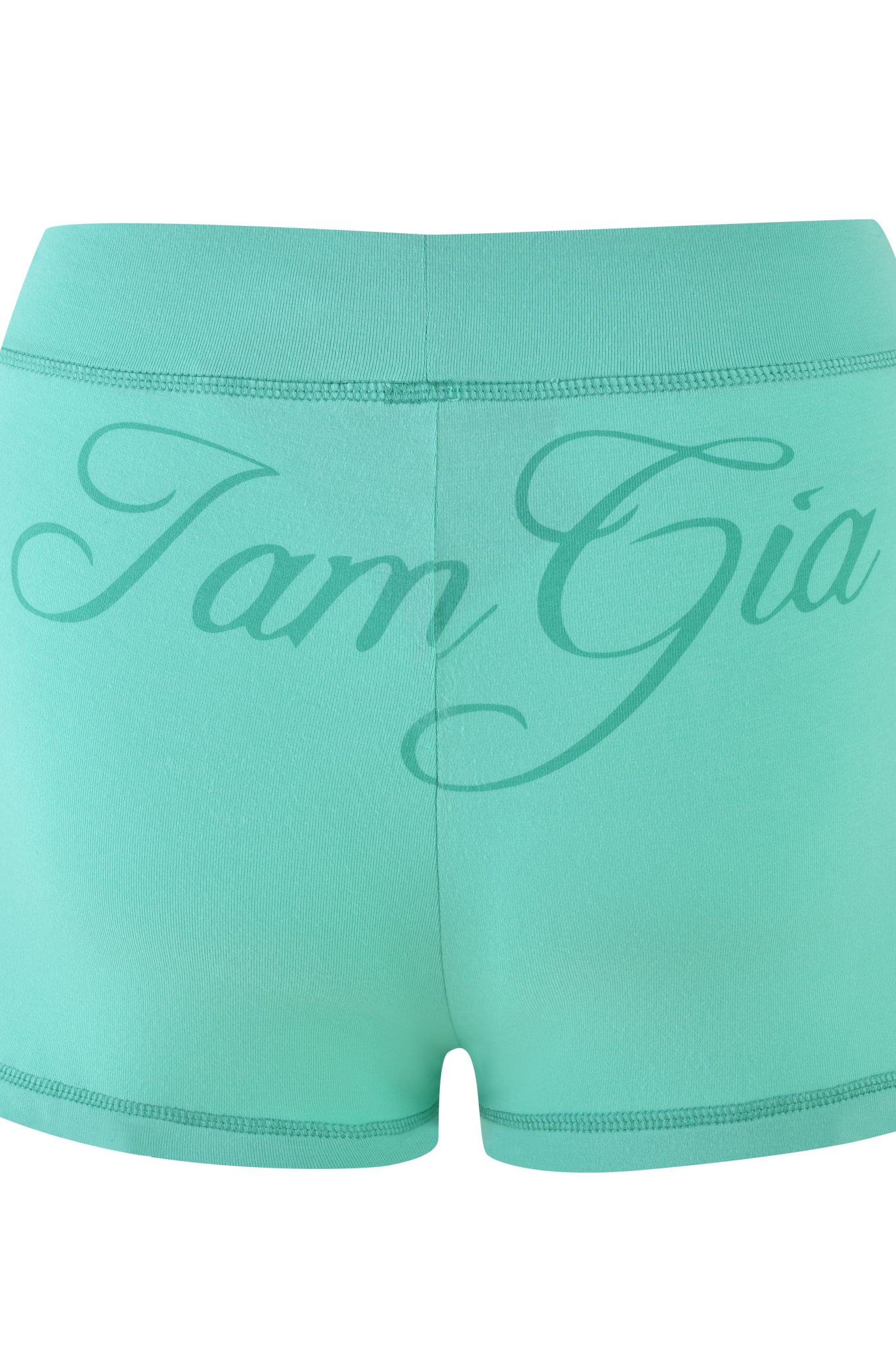 Teal green bodycon shorts made from stretchy bamboo fabric with "I.AM.GIA" elegantly scripted on the back waistband. Product: BLARE SHORT - GREEN : TURQUOISE : TEAL.