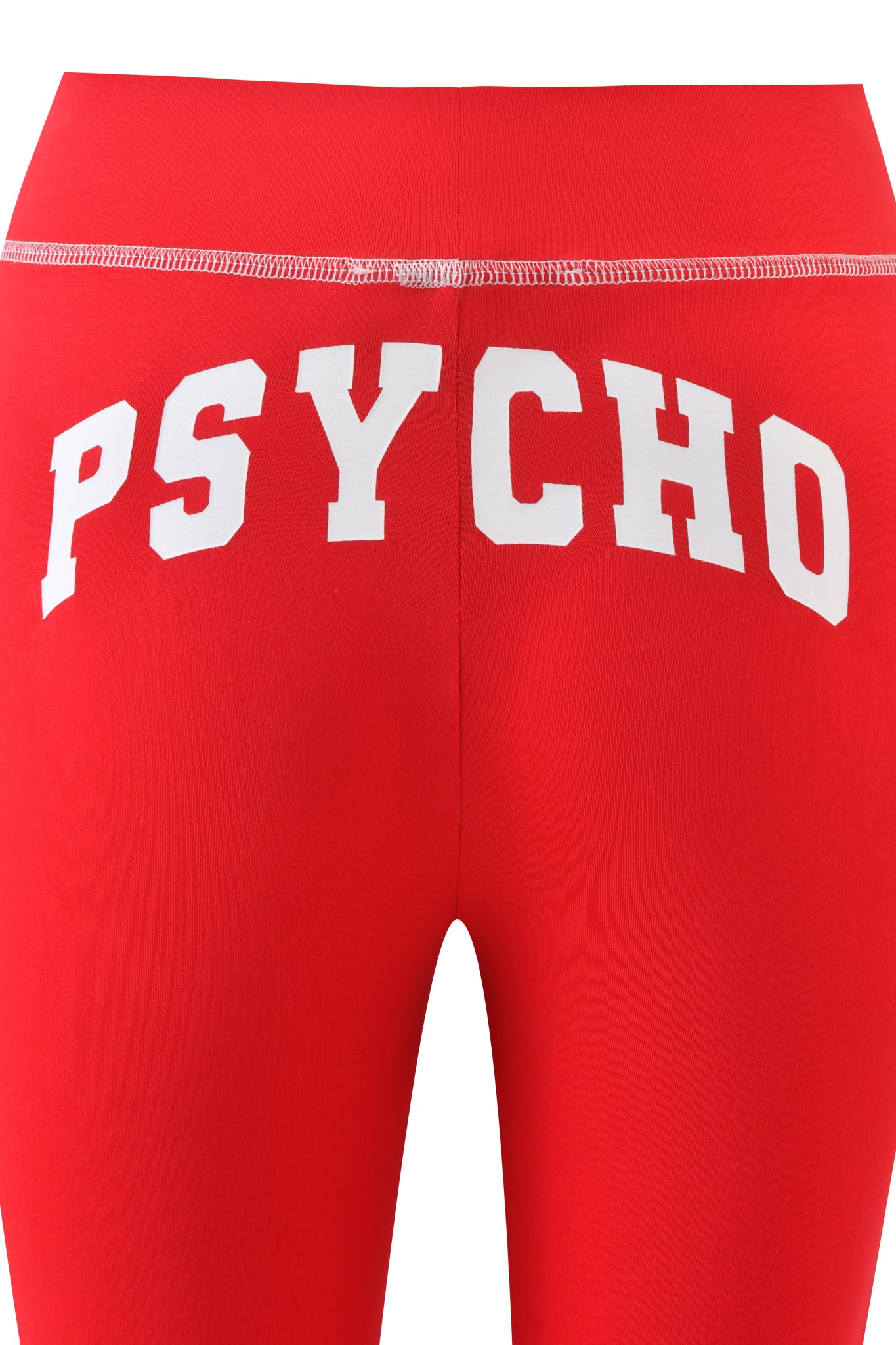 BLARE TRACKPANT - RED : PSYCHO : SALSA by I.AM.GIA features bold white "PSYCHO" lettering across the back waistband; these low-rise leggings make a fearless statement.