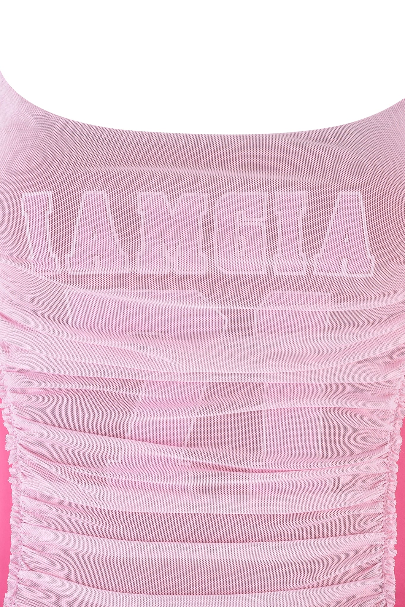 A close-up of the SUKI TANK - PINK by I.AM.GIA shows its hot pink bodycon fit with sleek ruching and texture. The word "IAMGIA" appears in bold, transparent letters across the top, highlighting its alluring design.