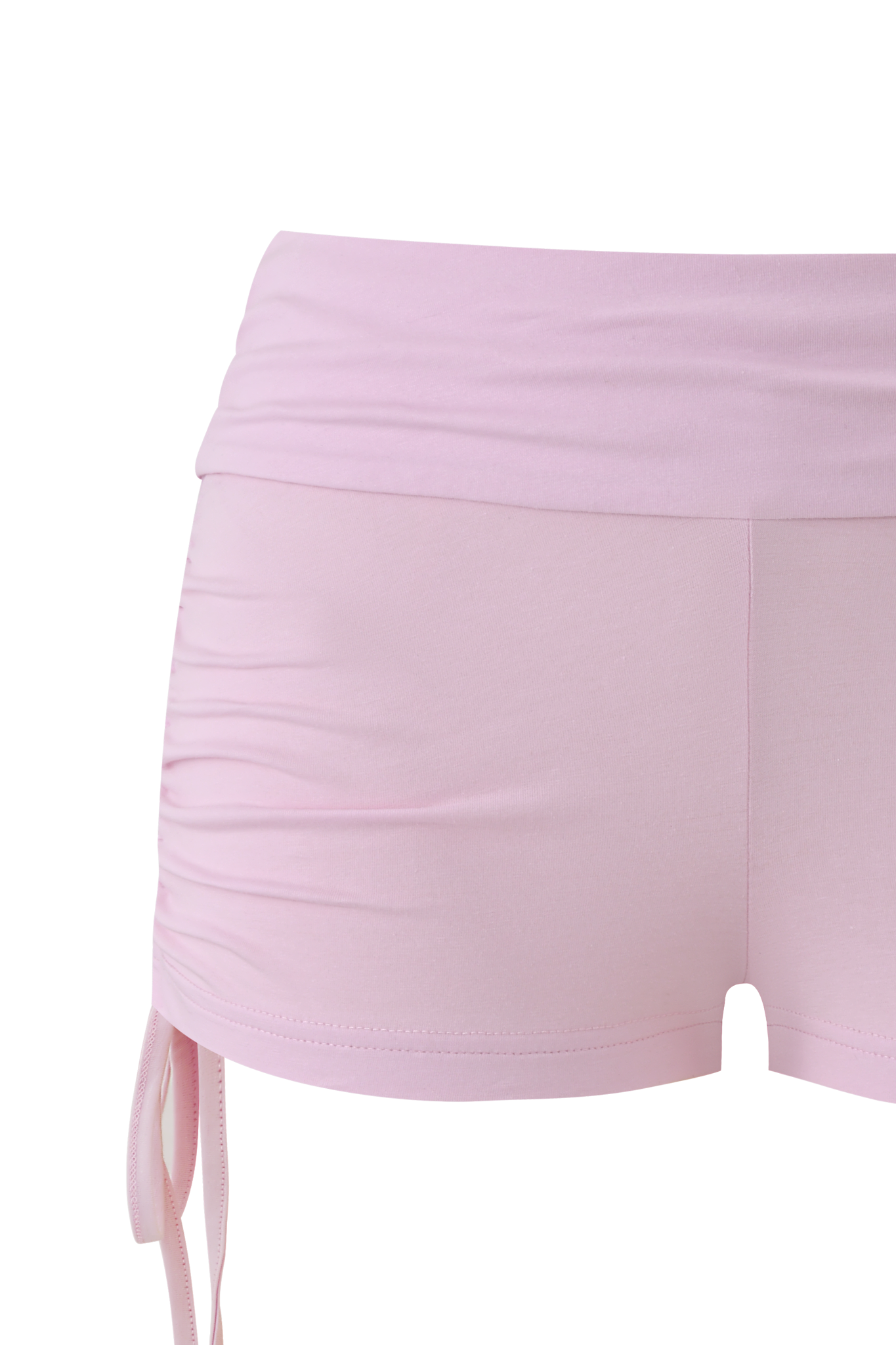 Close-up of the I.AM.GIA MIA JERSEY SHORT in baby pink, featuring a ruched side and small bow detail. Made from stretchy bamboo for a soft feel, these fitted shorts are perfect for lounging or casual wear.