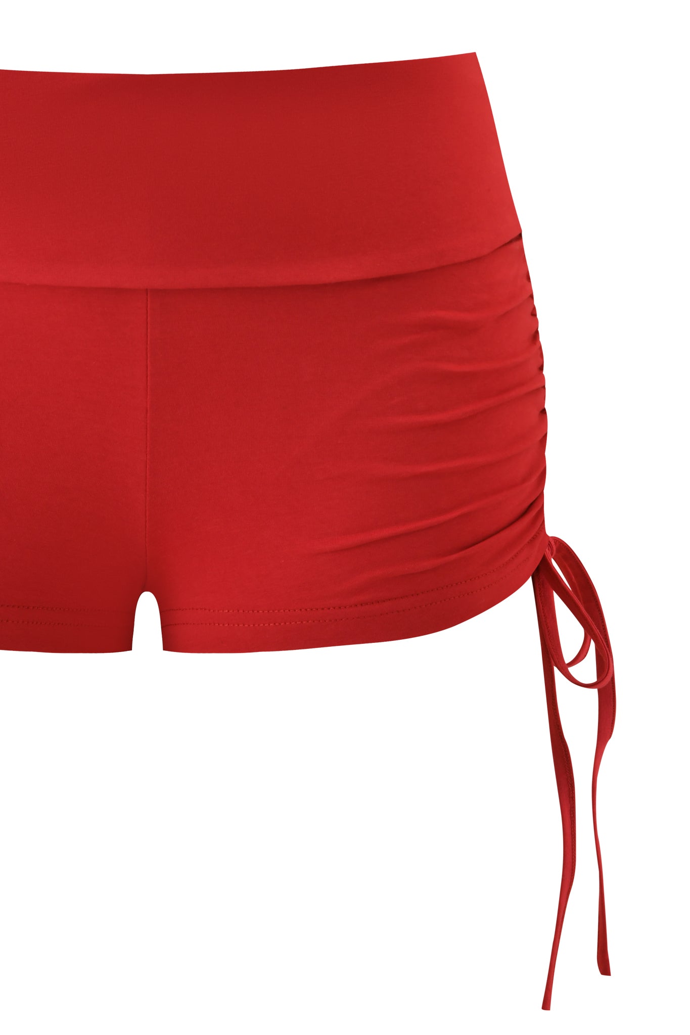 The I.AM.GIA MIA SHORT - RICH RED features a fold-over waistband, high-waisted fit, side ruching, and adjustable drawstring ties on one side, shown against a white background.