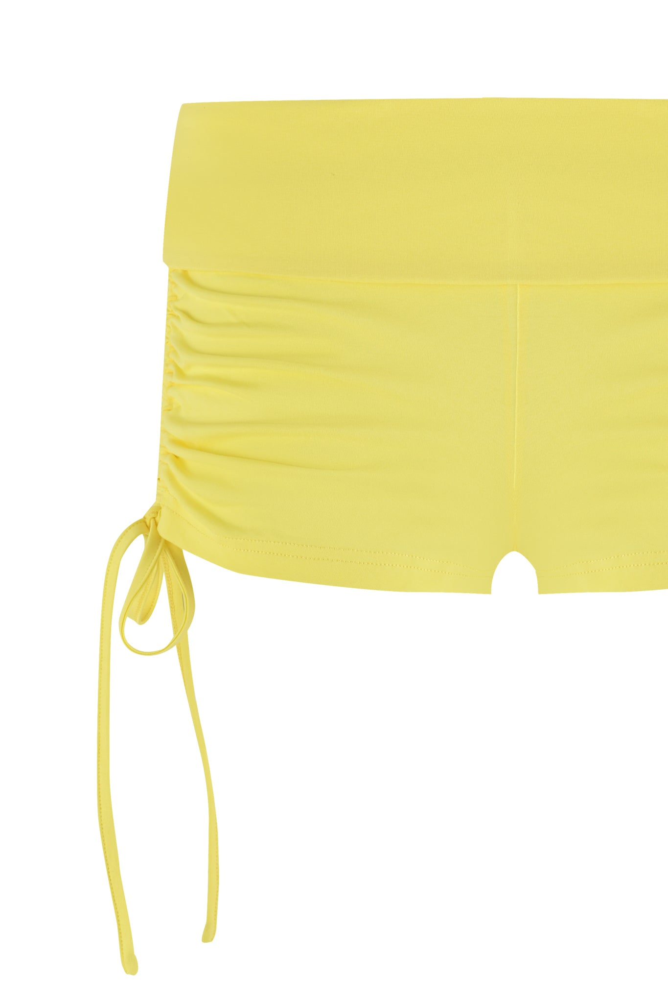 The MIA SHORT - YELLOW by I.AM.GIA combines comfort and elegance with its high-waisted design, wide waistband, bamboo fabric, and ruching. A long drawstring bow accents the ruched side, and a small notch cutout at the hem adds a playful touch.
