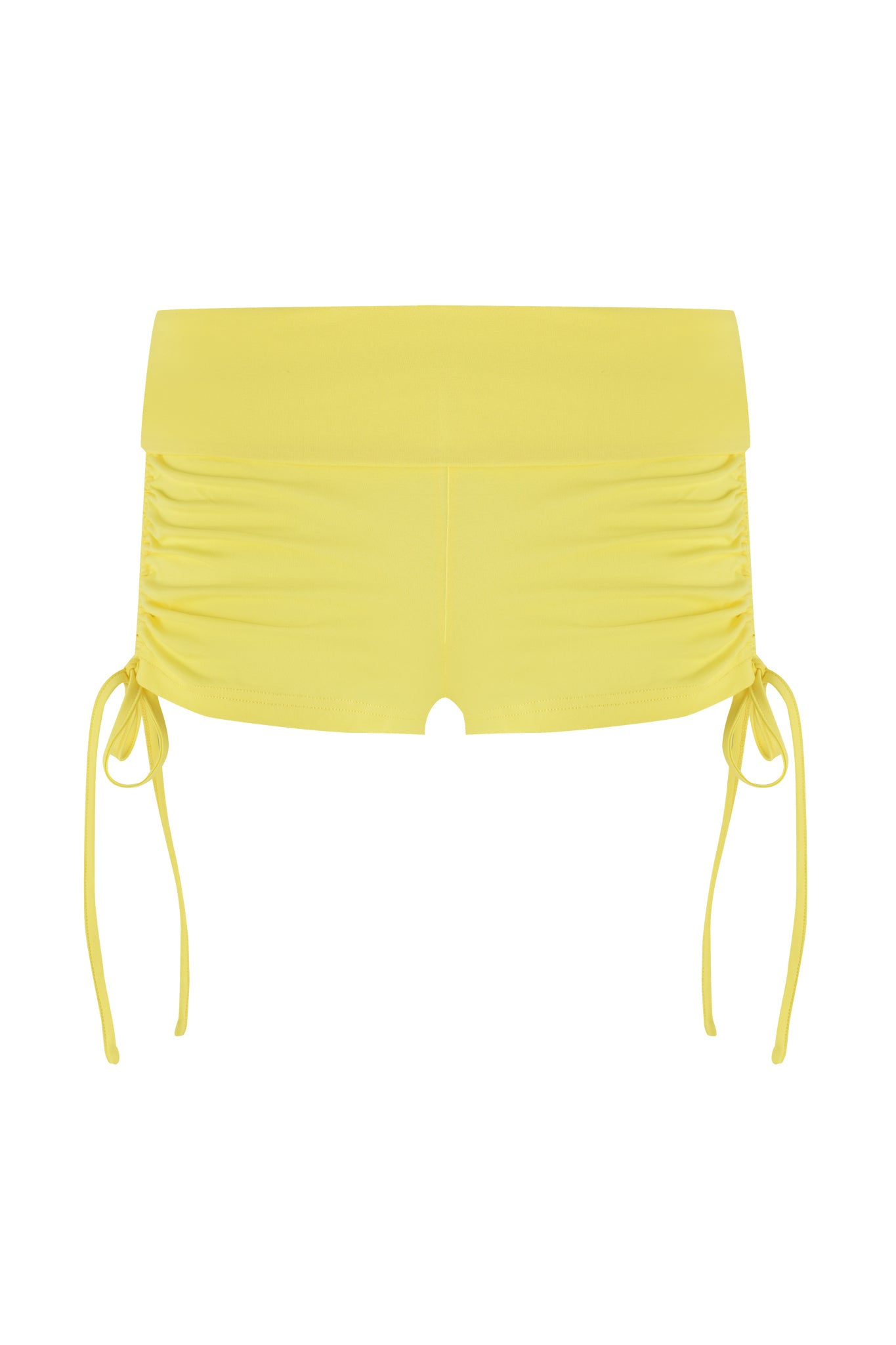 The I.AM.GIA MIA SHORT - YELLOW features high-waisted bamboo fabric with a wide waistband, side ruching, and decorative tied strings. The smooth, stretchy material provides a comfortable bodycon fit.