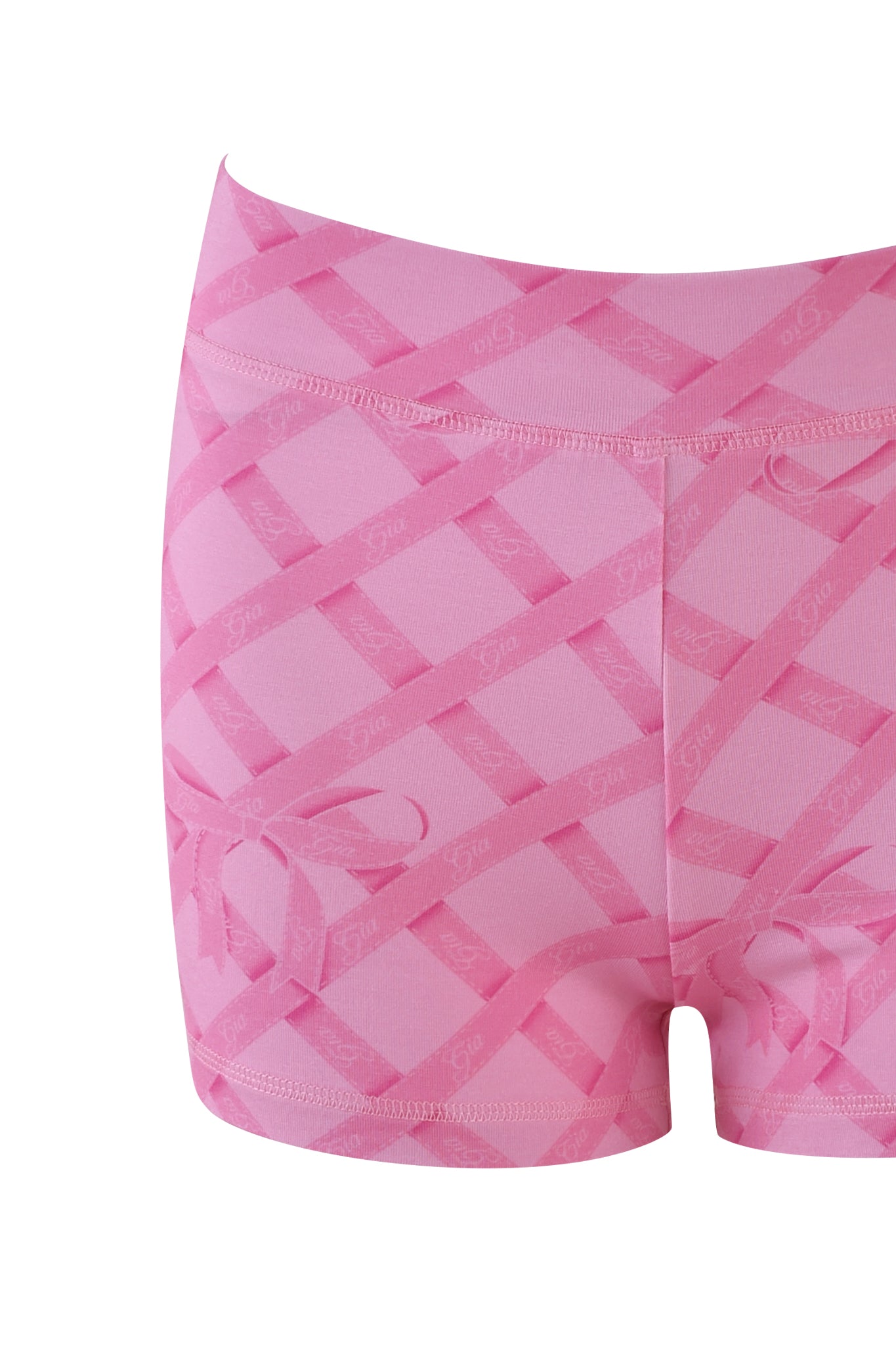Close-up of the I.AM.GIA BLARE SHORT in 'Wrapped in Gia,' showcasing a pink crisscross pattern. Crafted from stretchy bamboo fabric, it features a comfortable elastic waistband.