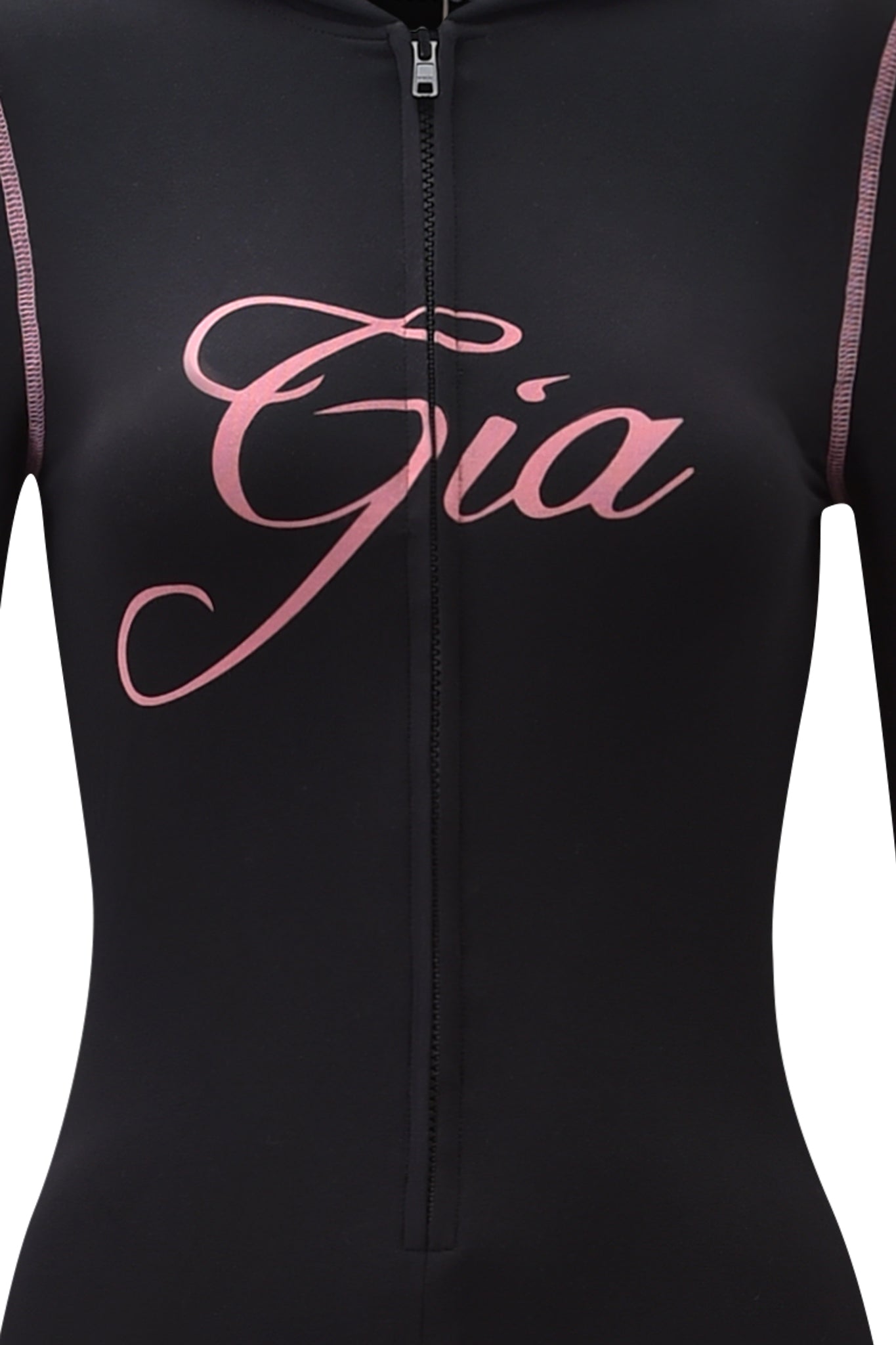 A close-up of the I.AM.GIA BLARE JUMPSUIT in black, featuring a front zipper and "Gia" in large pink cursive lettering across the chest.