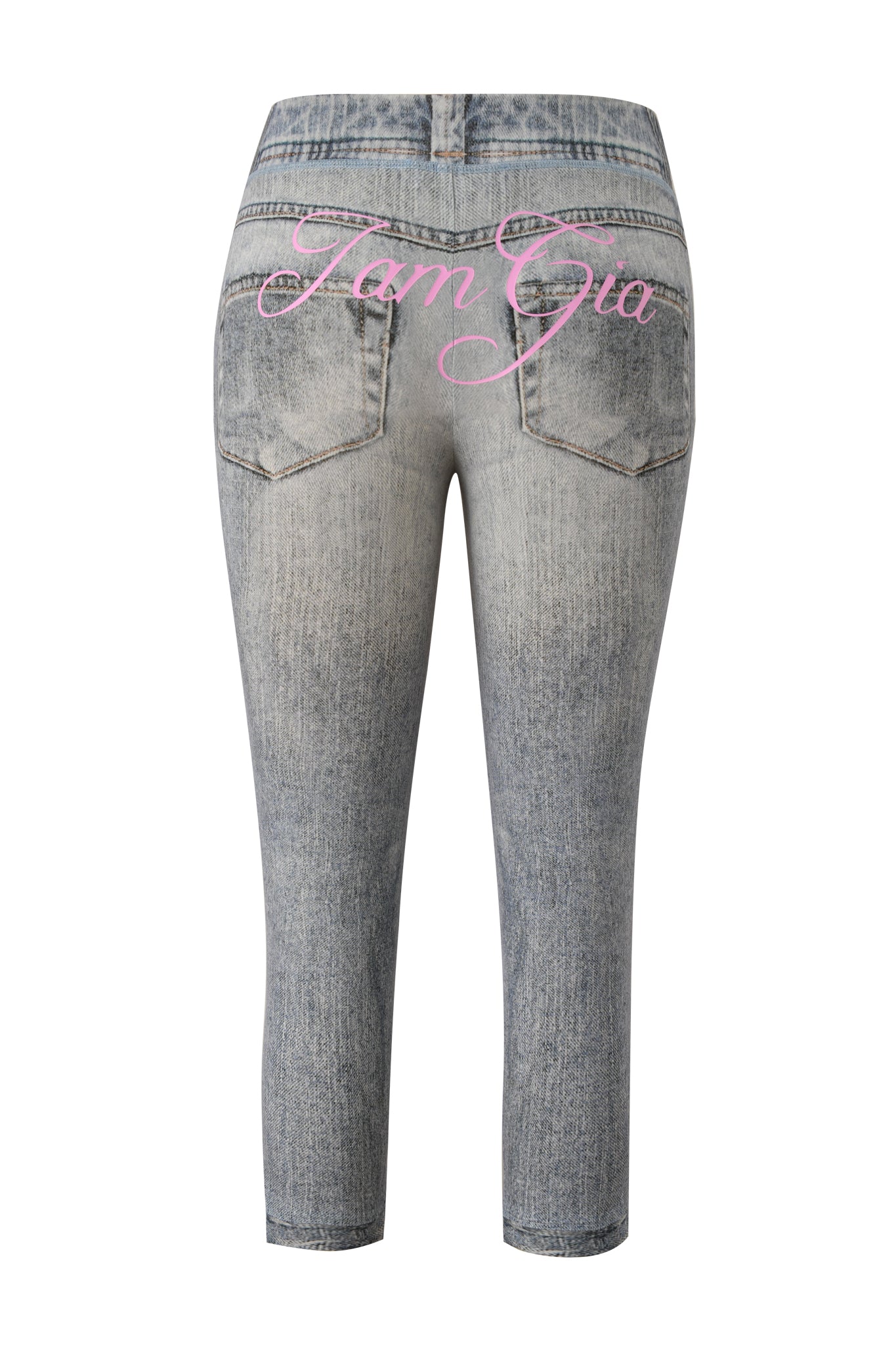 Back view of the BLARE CAPRI - DENIM TROMPE L'OEIL by I.AM.GIA, featuring a faded light-wash faux-denim effect and large pink "Iam Gia" cursive script across the back above the pockets.