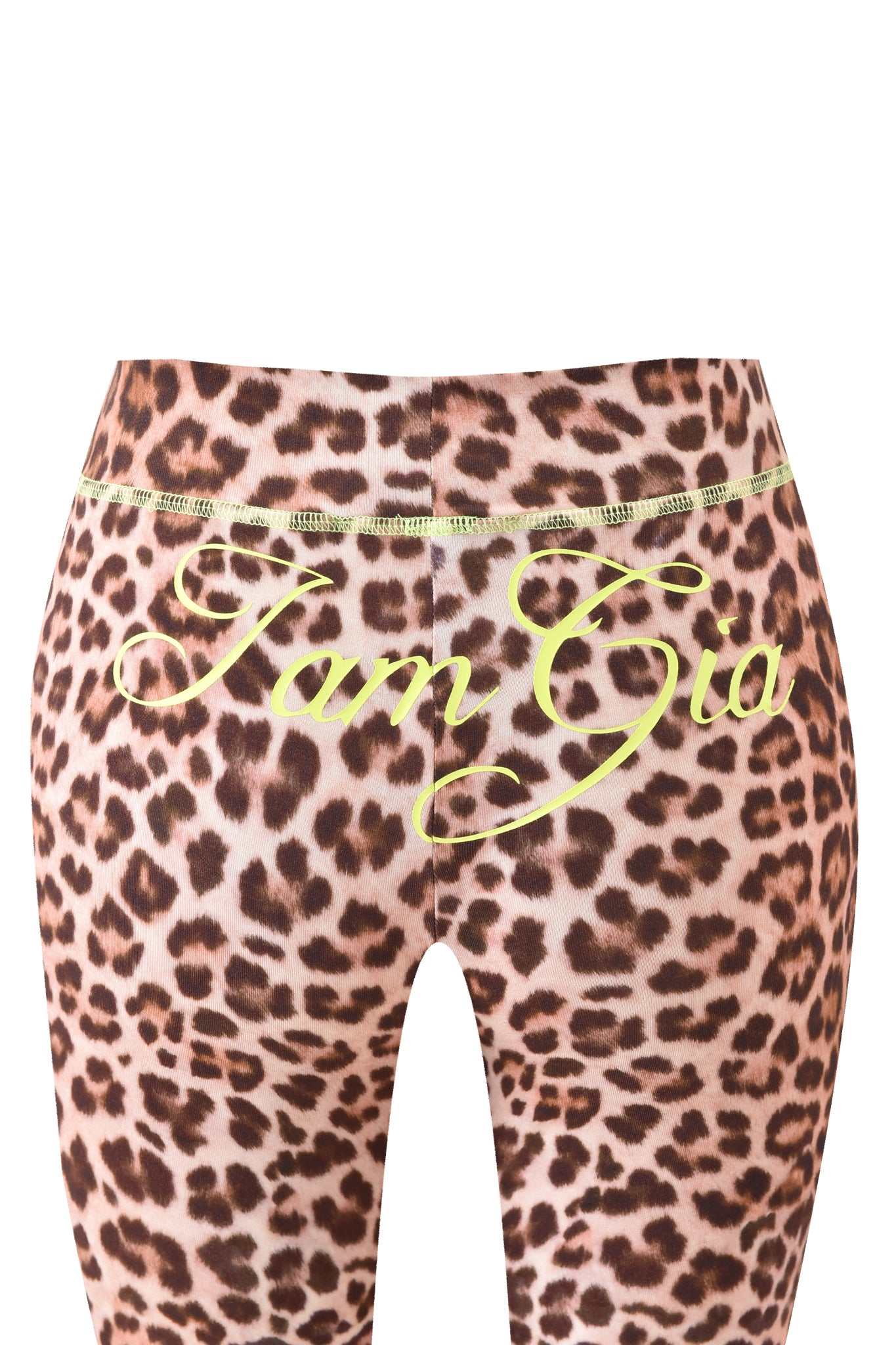 The BLARE CAPRI - LEOPARD by I.AM.GIA features bold yellow "I am Gia" script on leopard print capri pants, adding a fierce edge to the classic bodycon style.