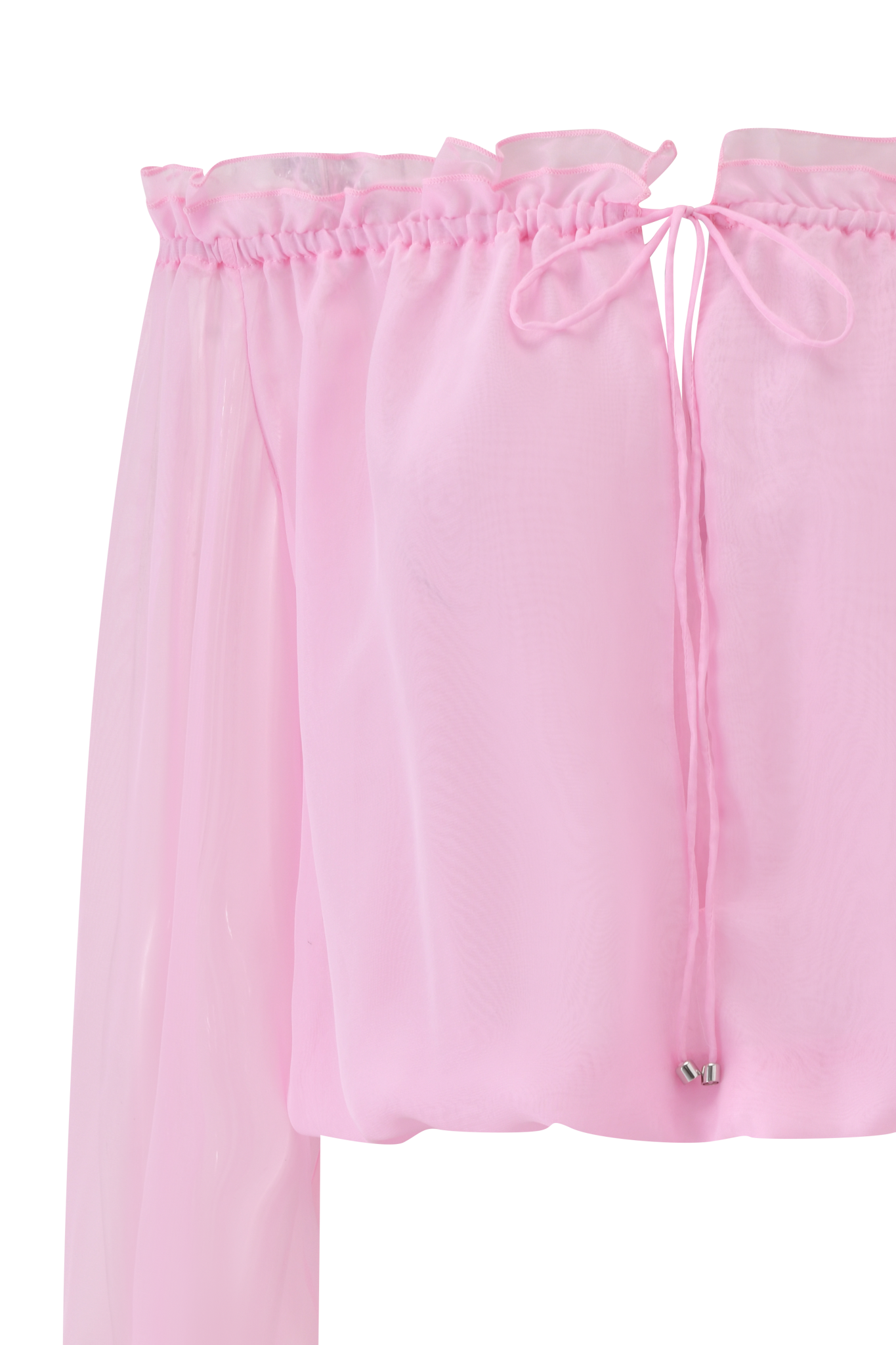 A close-up of the JAZMIN TOP - BABY PINK by I.AM.GIA, a sheer georgette off-shoulder blouse with a ruffled top edge, tie neckline detail, and long flowing sleeves.
