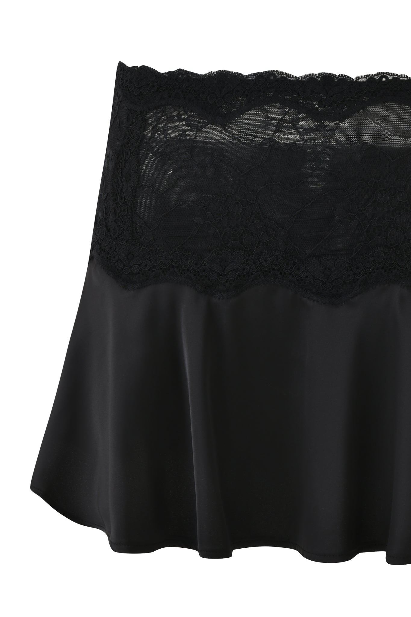 The ASHLING MINI SKIRT by I.AM.GIA is a black satin mini skirt with a wide floral lace waistband and soft, flowing fabric, offering an elegant and delicate look.