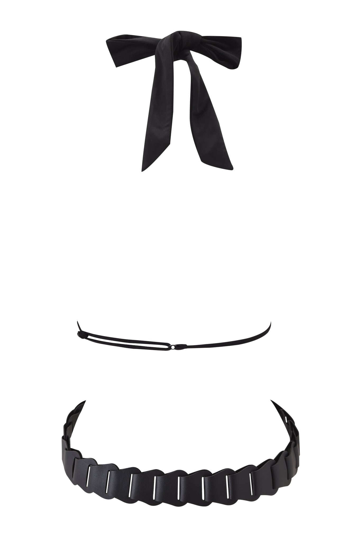 The SALDANA TOP - BLACK by I.AM.GIA is displayed on a white background, shown with a bow tie, a thin choker necklace, and a wide faux leather belt featuring scalloped edges and an adjustable strap.