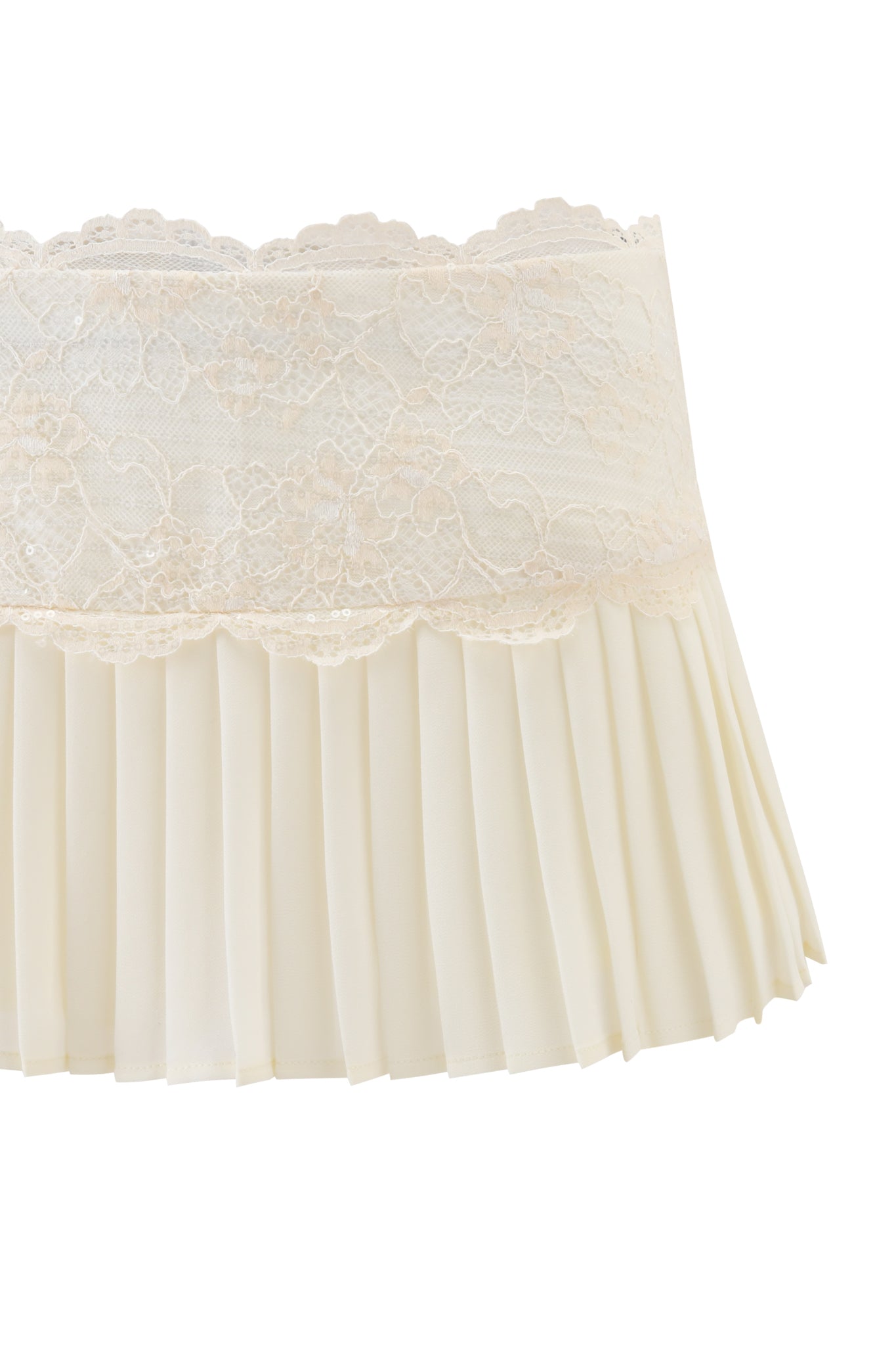 A close-up of the I.AM.GIA SALOME MINI SKIRT in ivory shows a lace band at the waist and micro-pleated georgette fabric, set against a white background.