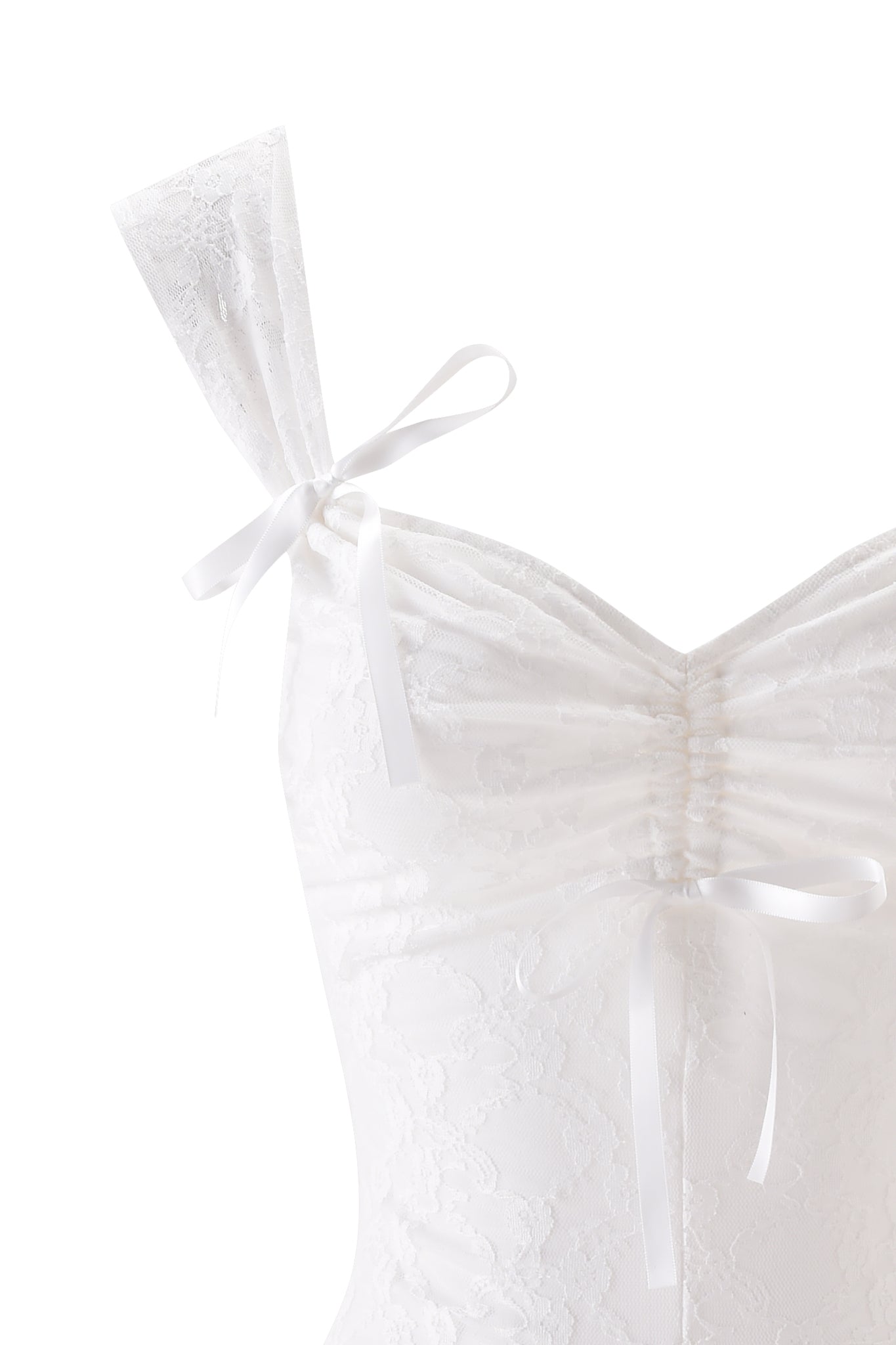 The SONNET PLAYSUIT - WHITE by I.AM.GIA features white lace, a sweetheart neckline, ruched bust, delicate shoulder strap with satin ribbon bow, and a satin bow at the bodice above micro mini shorts for a playful finish.
