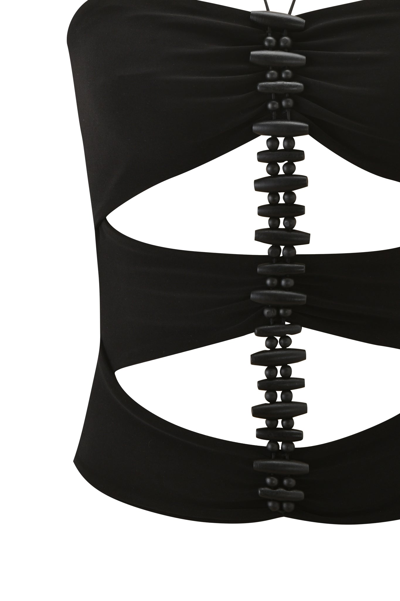 Close-up of the FENNICK TOP in black by I.AM.GIA, a bodycon boob tube featuring three horizontal cutouts and a central row of black bead-like fasteners running vertically down the front.