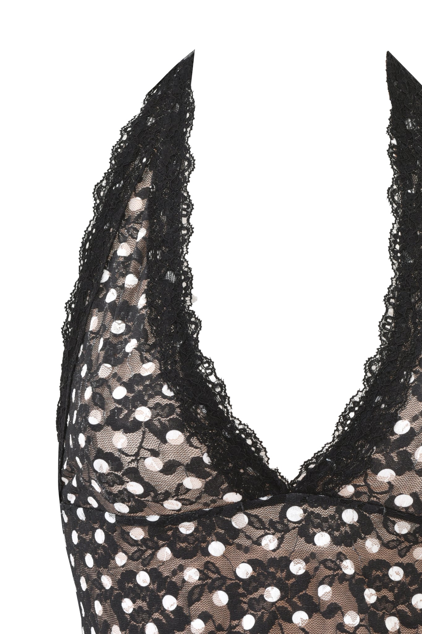 Close-up of the GEM HALTER TOP - BLACK POLKA DOT by I.AM.GIA, featuring a deep V-neckline with lace trim. The black polka dot lace top is displayed on a white background without any mannequin or model.