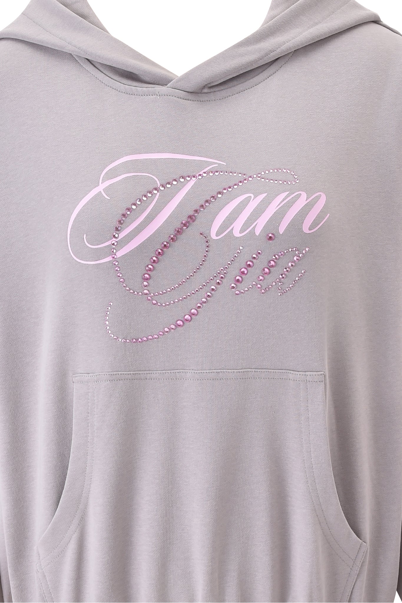 Close-up of the I.AM.GIA KADE HOODIE in grey, featuring a relaxed fit, front pocket, and pink cursive "I am Gia" text on the chest embellished with sparkling pink rhinestones.