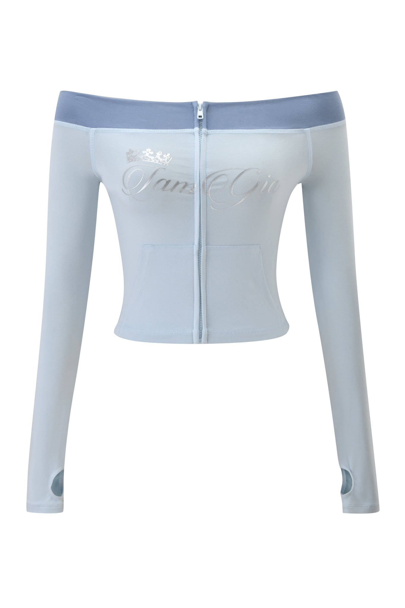 The BLARE OFF SHOULDER TOP - TWO TONE POWDER BLUE by I.AM.GIA is a light blue, zip-up off shoulder top made from buttery-soft viscose with long sleeves, thumb holes, and “Lans Grin” silver embroidery under a small crown.
