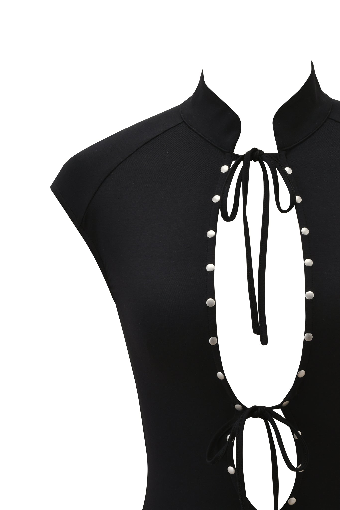 The GEORGIA TOP - BLACK by I.AM.GIA is a bodycon black jersey knit cap-sleeve top with a high collar, two bow tie closures at the neckline and midsection, and a large oval front cutout edged in small silver studs.