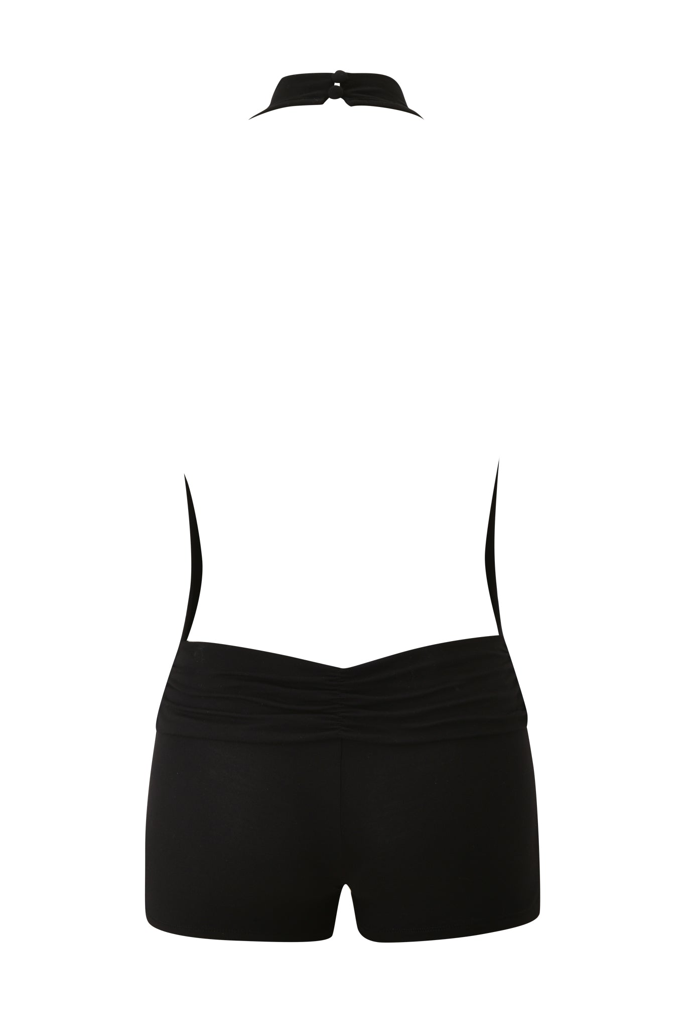 A back view of the KAIRA PLAYSUIT - BLACK by I.AM.GIA, a black halter neck playsuit in bamboo viscose jersey with an open back and low-cut mini shorts, shown against a white background.