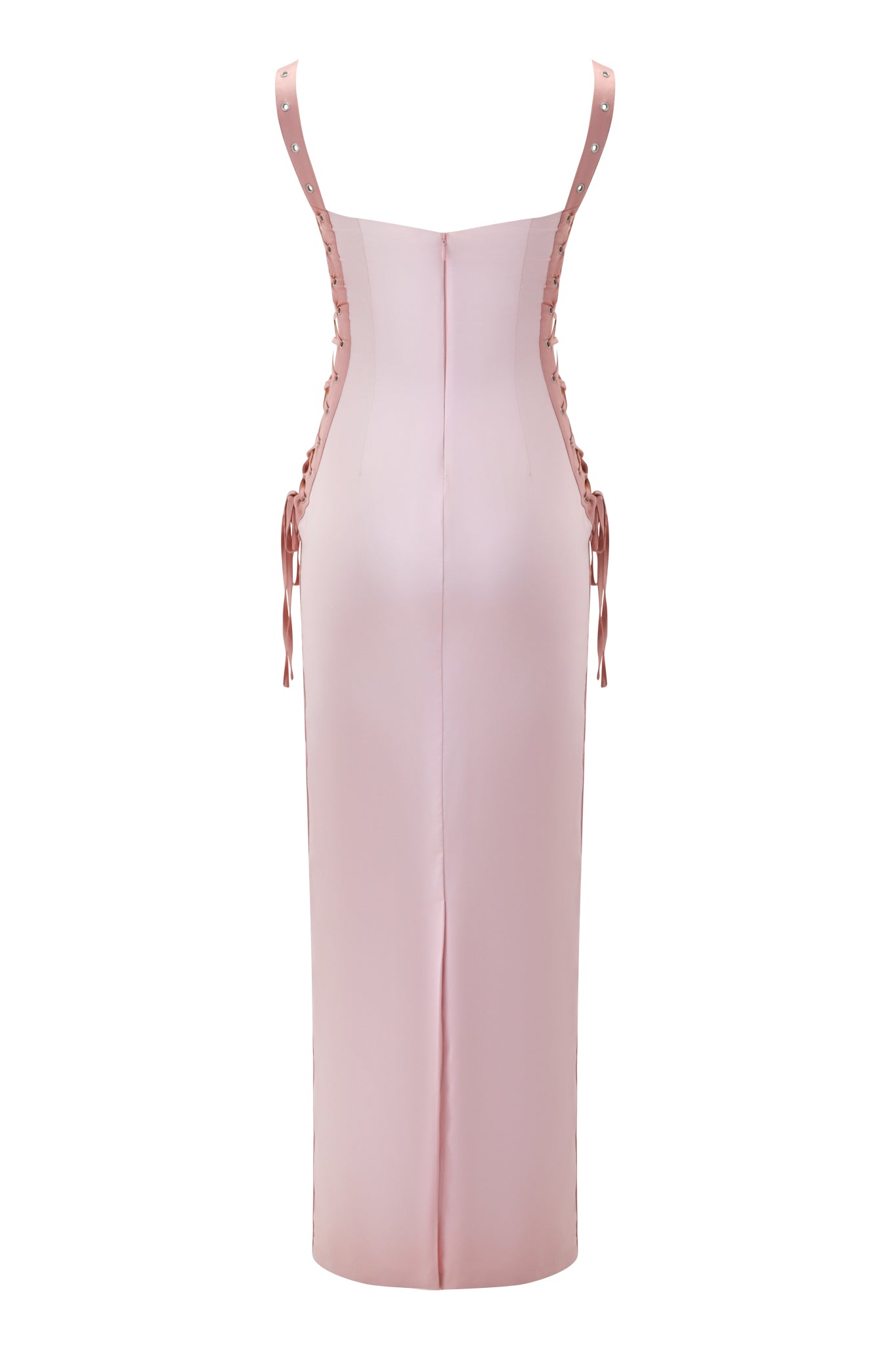 Back view of the ASHLEE MAXI DRESS - PINK by I.AM.GIA, a light pink stretch satin dress with thin straps, lace-up side details, center seam, and a small bottom slit.