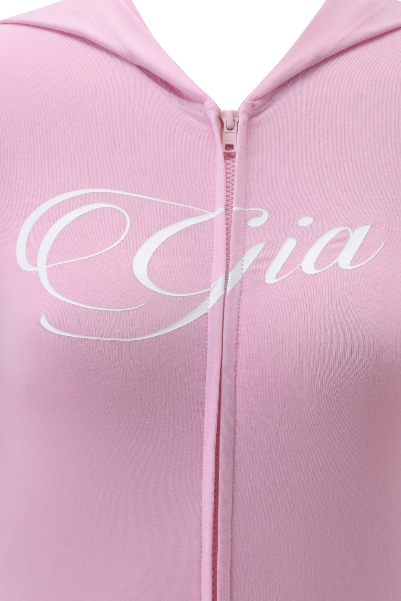 Close-up of the BLARE PIPING HOODIE in baby pink and white by I.AM.GIA, featuring a sporty style with "Gia" in white cursive across the chest.