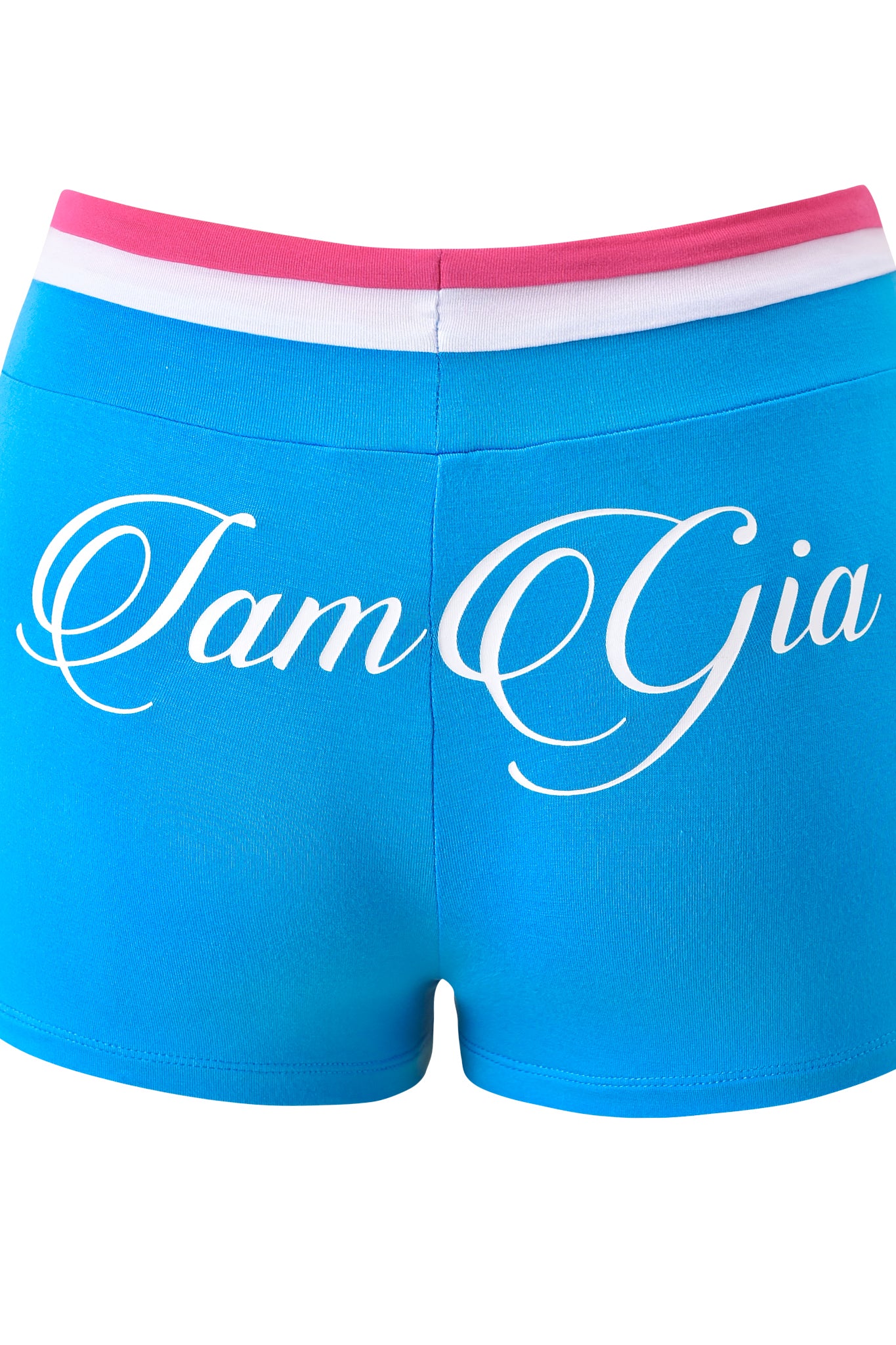 The BLARE STRIPED SHORT - SKY BLUE by I.AM.GIA features a sporty design with a white and pink waistband, plus bold "Iam Gia" cursive on the back—capturing the brand’s iconic shorts style.
